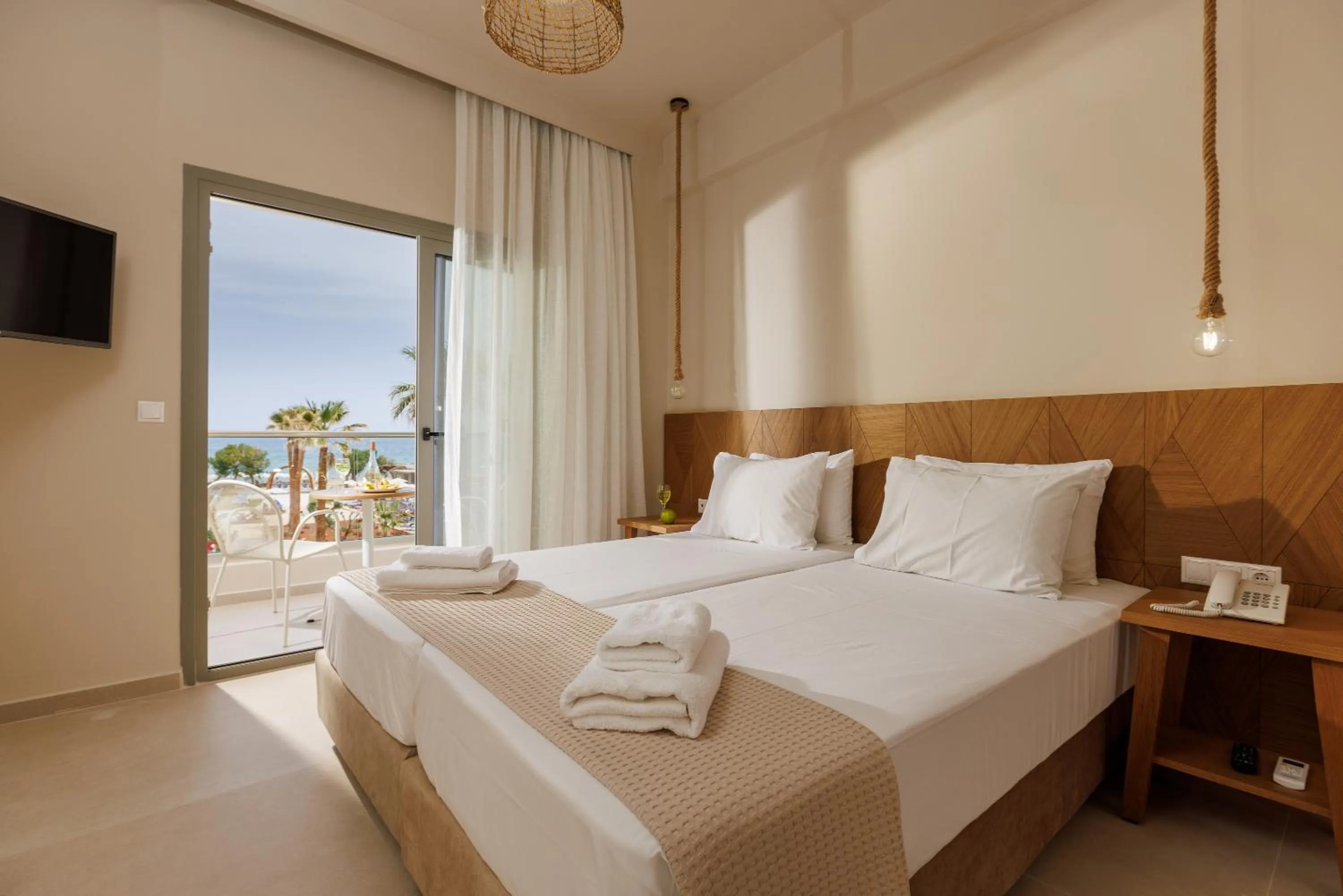 Bed in Malia Bay Beach Hotel & Bungalows