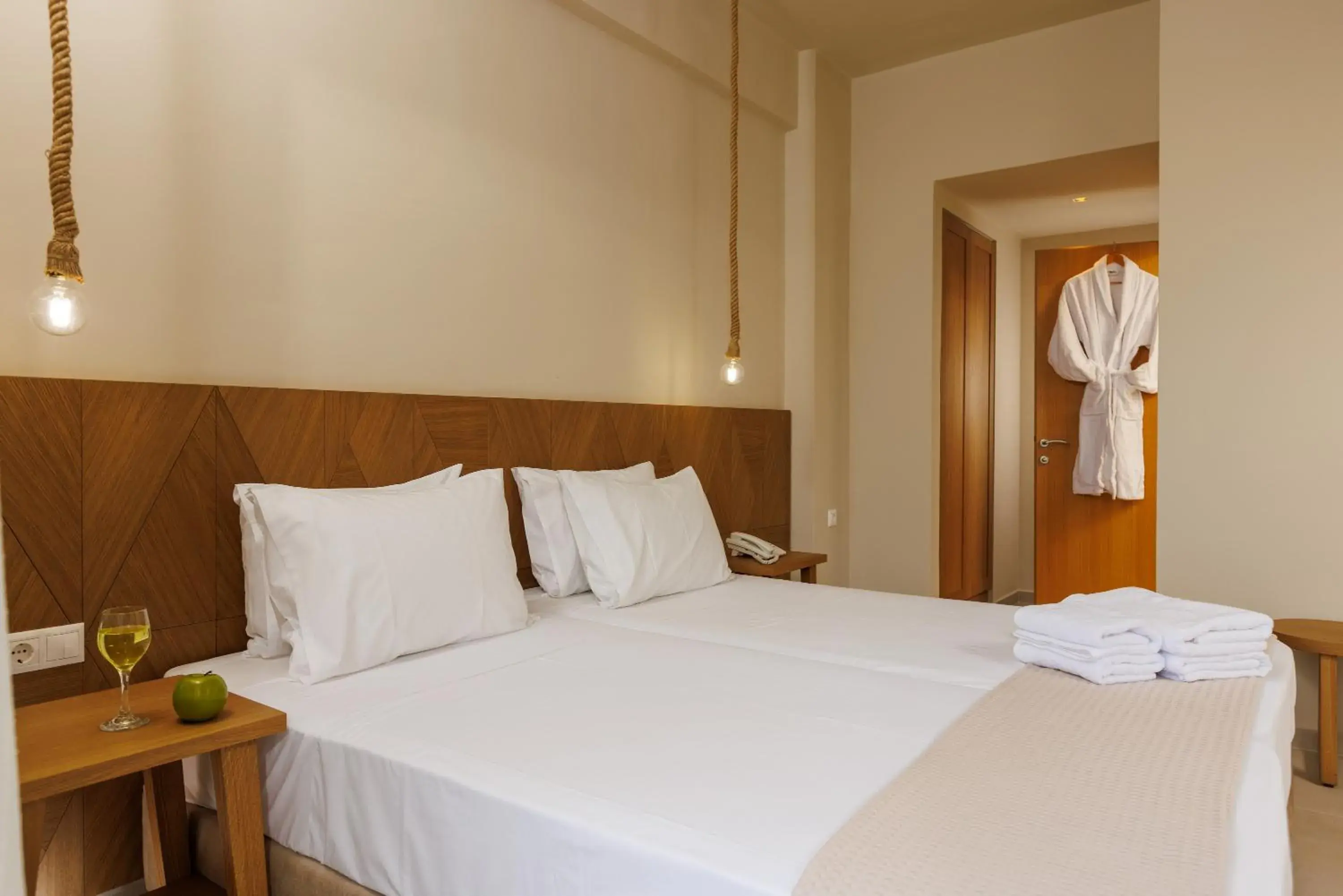 Bed in Malia Bay Beach Hotel & Bungalows Bed in Malia Bay Beach Hotel & Bungalows