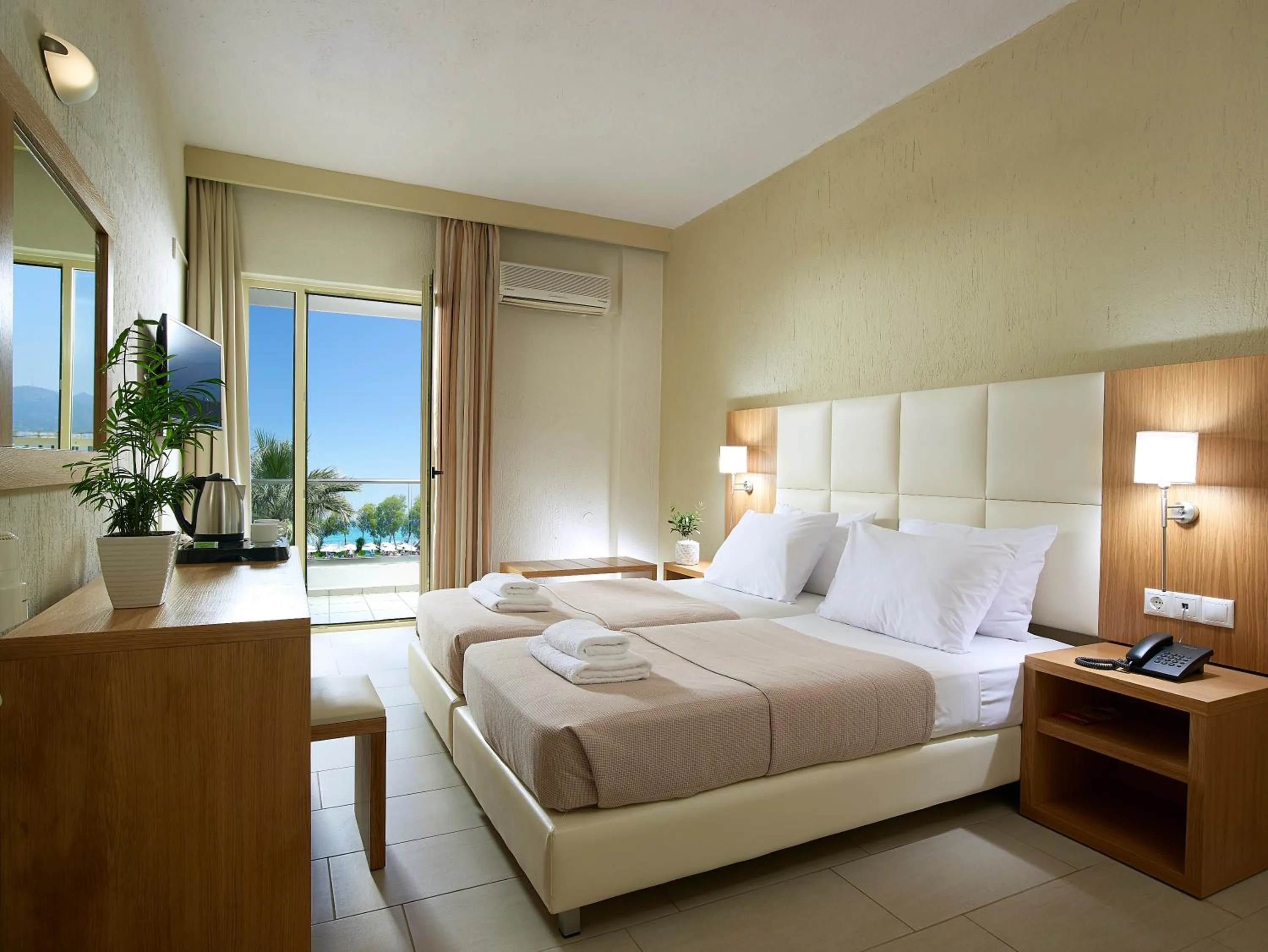 Bed in Malia Bay Beach Hotel & Bungalows
