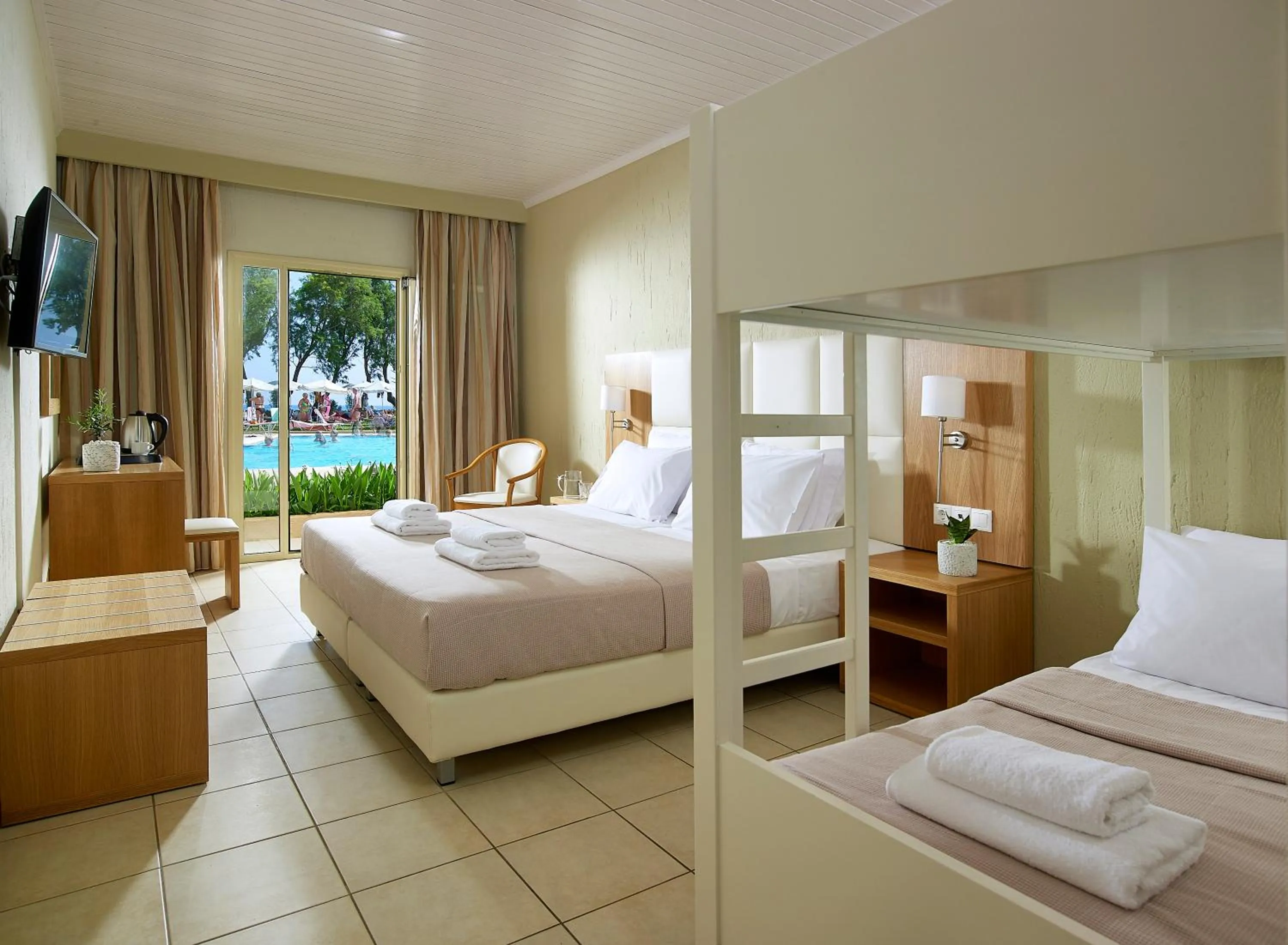 Bed in Malia Bay Beach Hotel & Bungalows