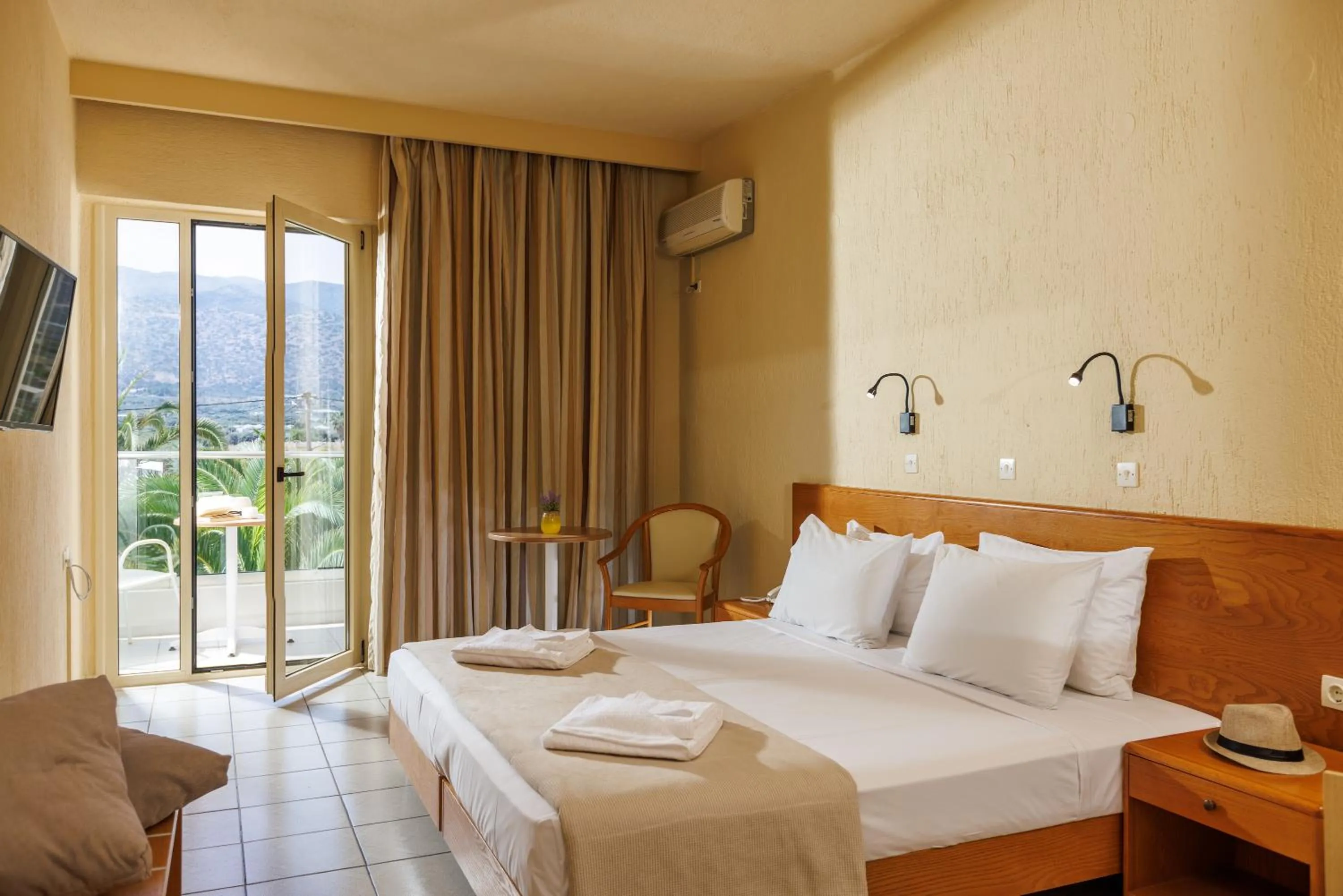 Bed in Malia Bay Beach Hotel & Bungalows