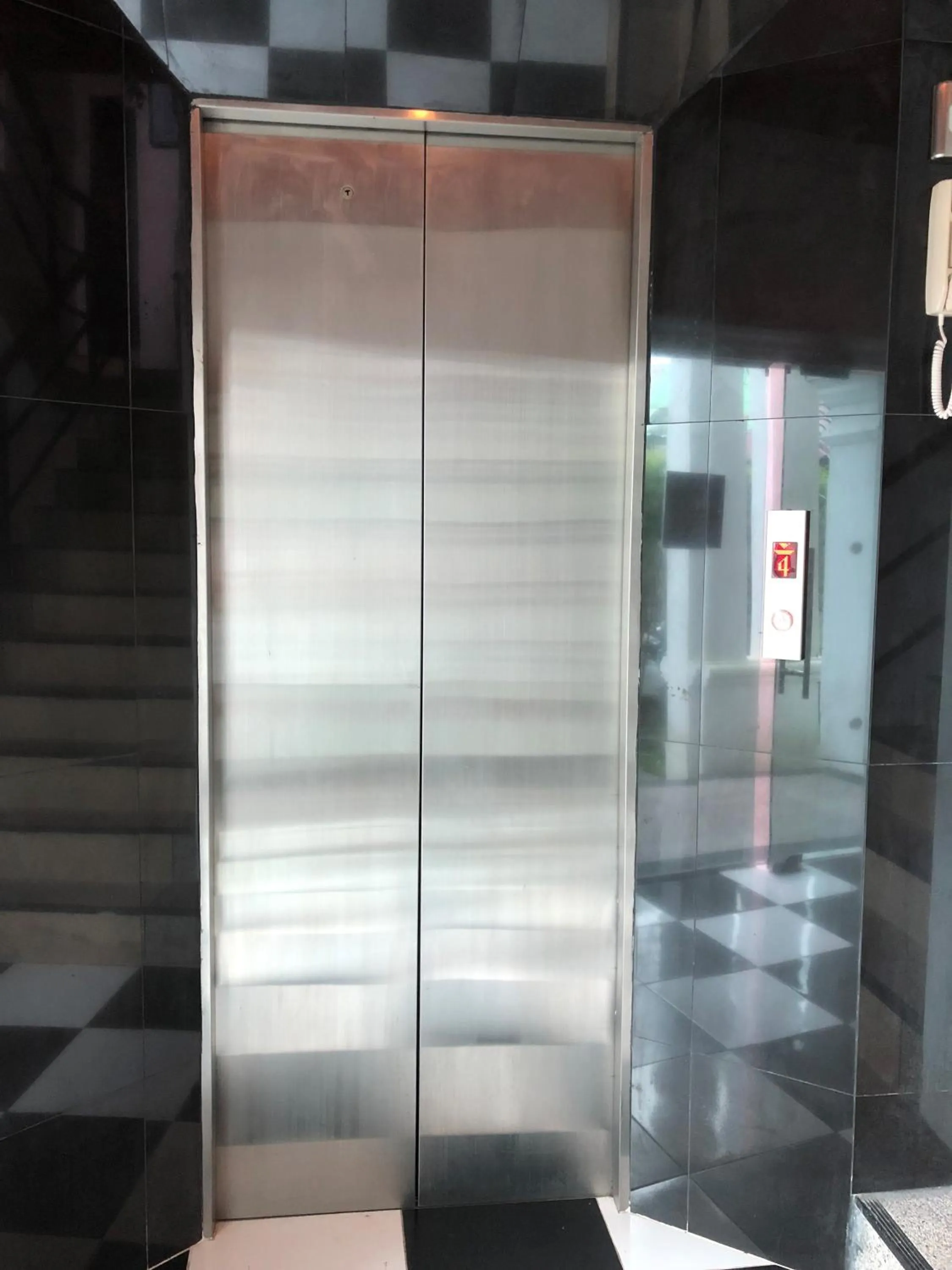 elevator in Orchid Kathu Heights Service Apartments