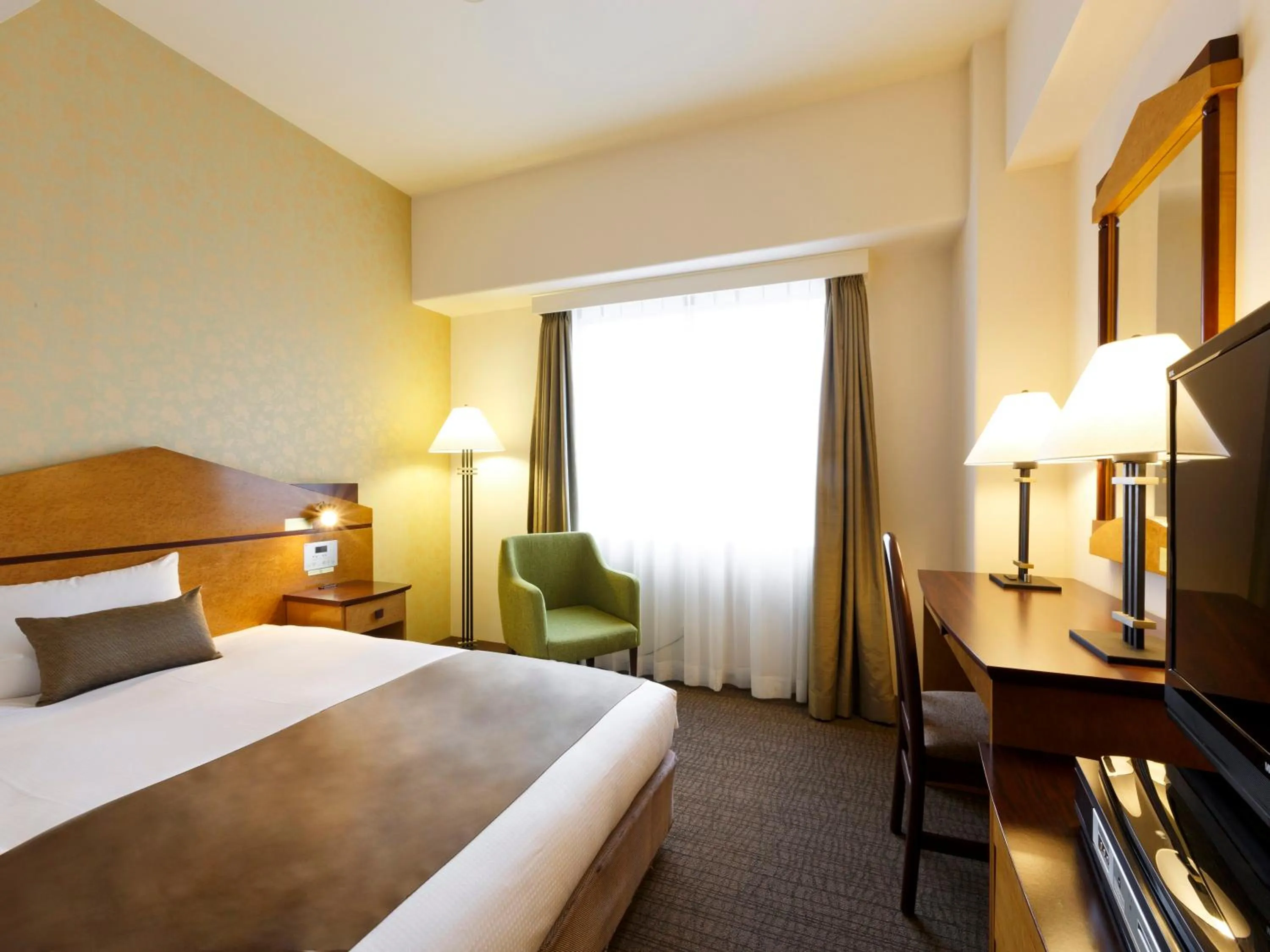 Bed in Hotel Resol Gifu