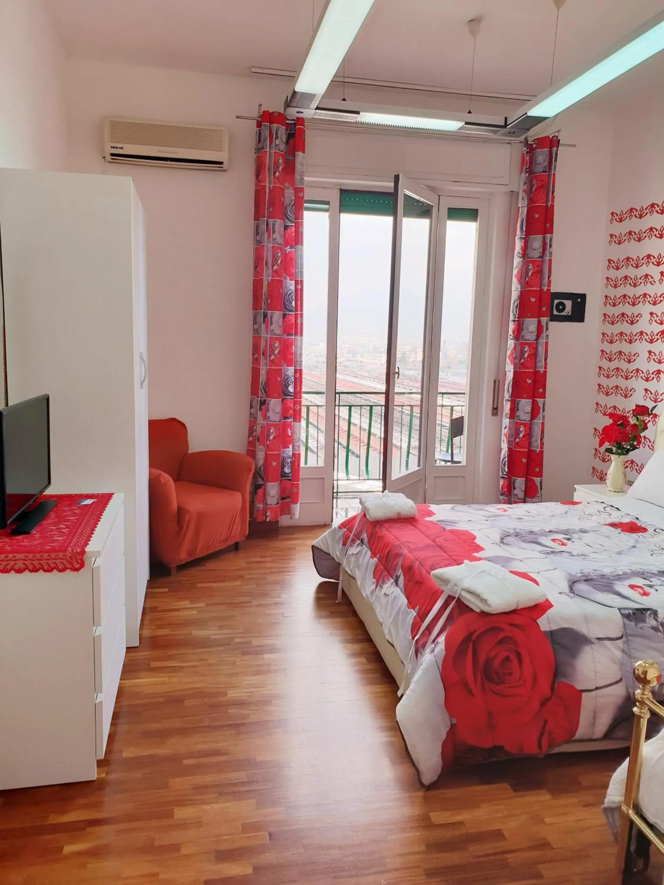 Triple Room with Balcony and Shared Bathroom in Blue Crystal NAPOLI ROOMS Triple Room with Balcony and Shared Bathroom in Blue Crystal NAPOLI ROOMS