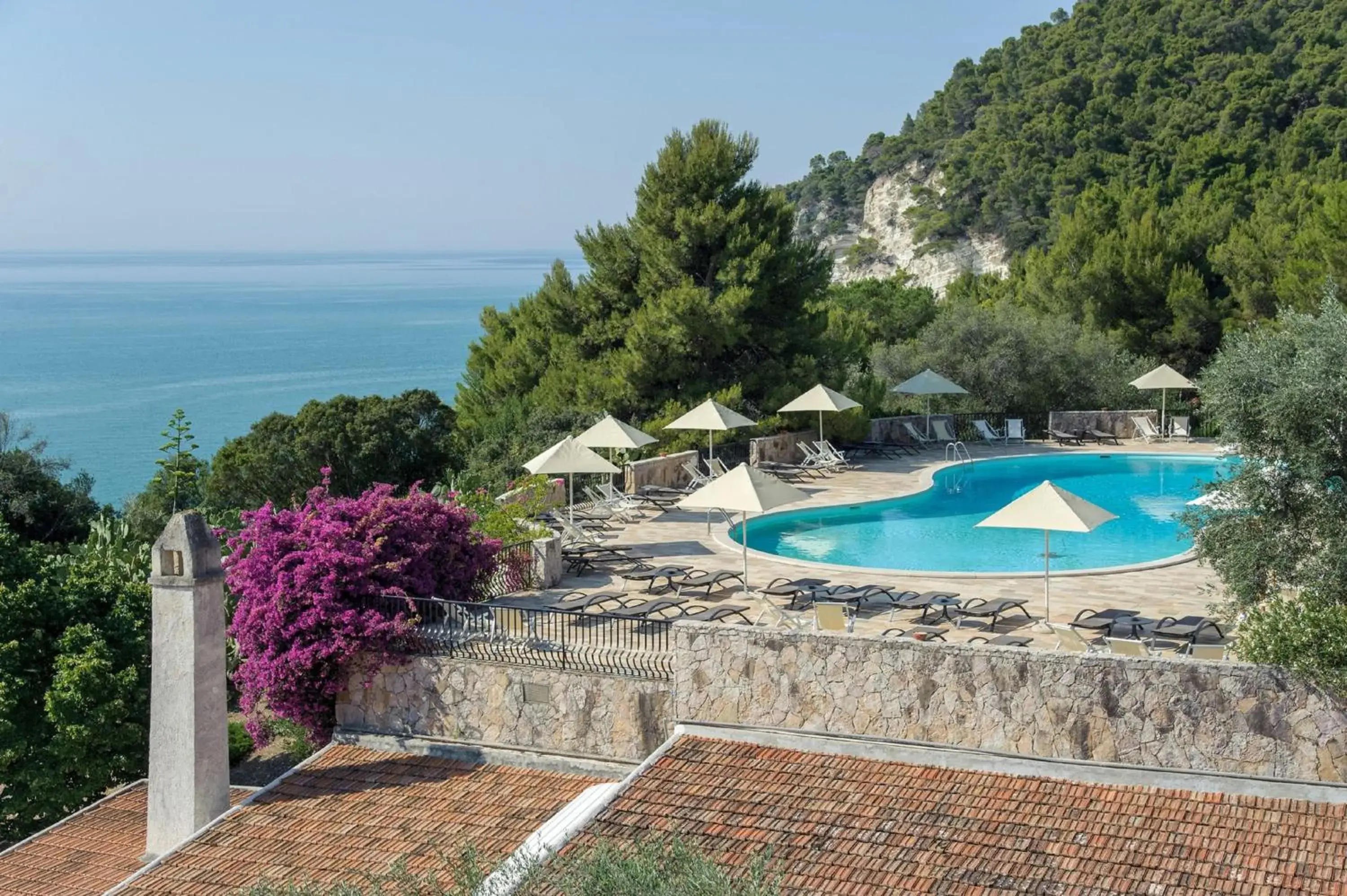 Swimming pool in Baia Delle Zagare - Handwritten Collection Swimming pool in Baia Delle Zagare - Handwritten Collection