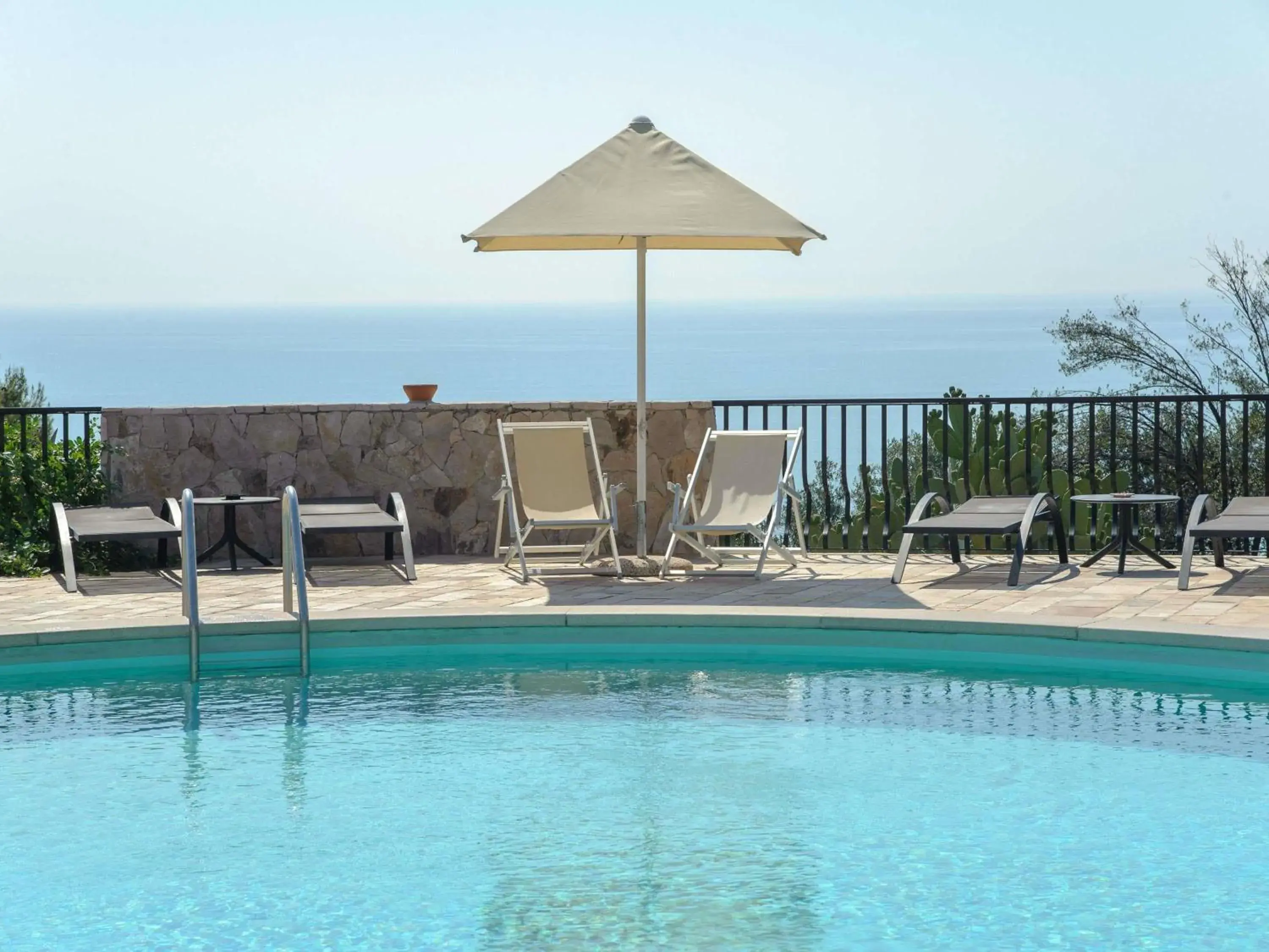 Pool view in Baia Delle Zagare - Handwritten Collection Pool view in Baia Delle Zagare - Handwritten Collection