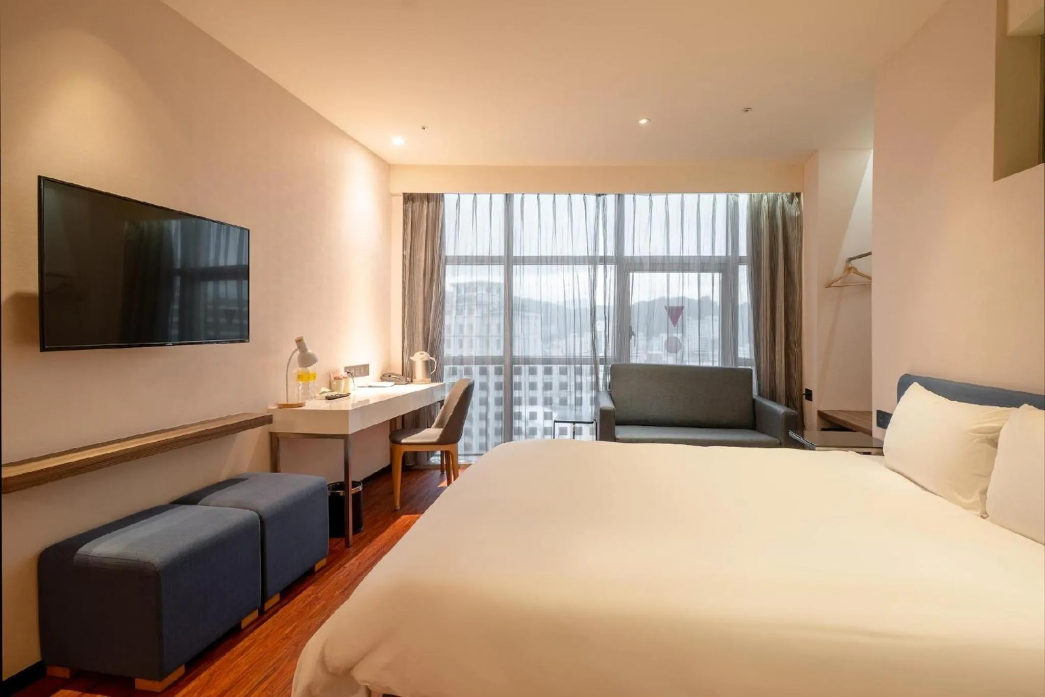 Living room, Bed in CHECK inn Taipei Xinyi