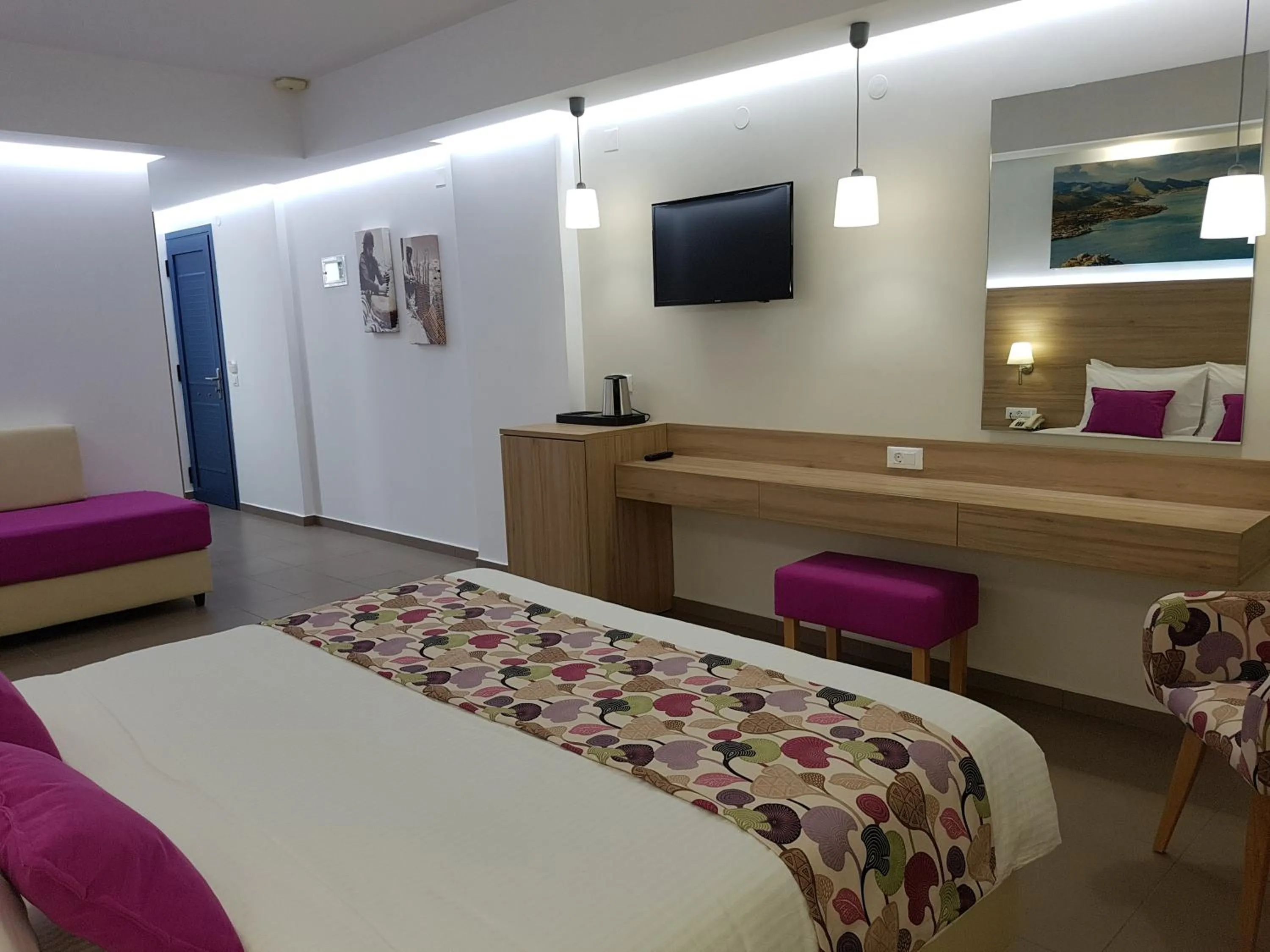 Coffee/tea facilities in Astra Village & Suites