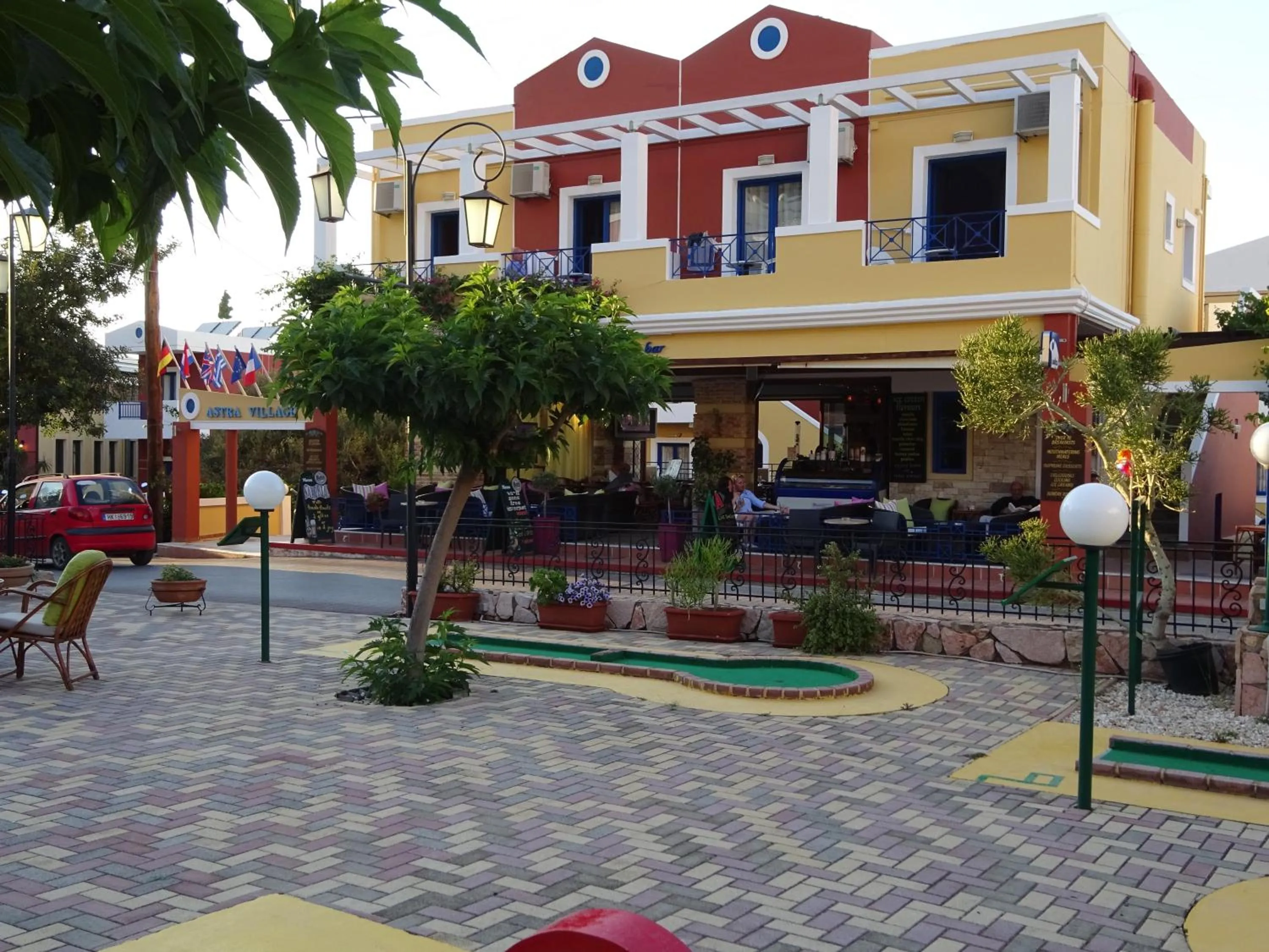 Property building in Astra Village & Suites