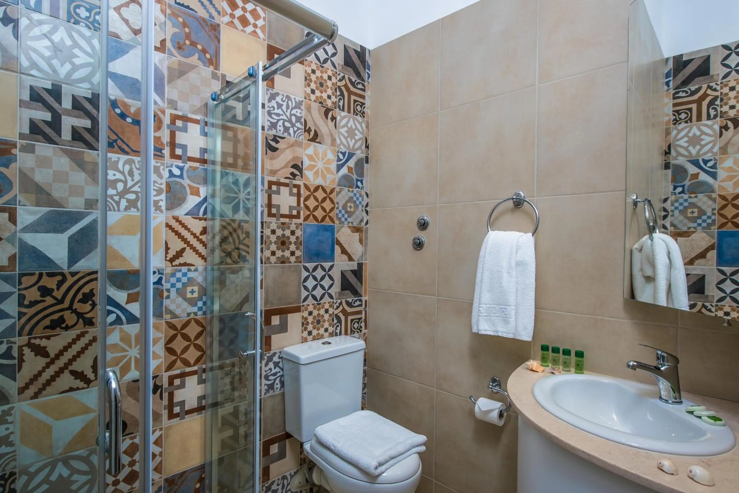 Shower in Astra Village & Suites