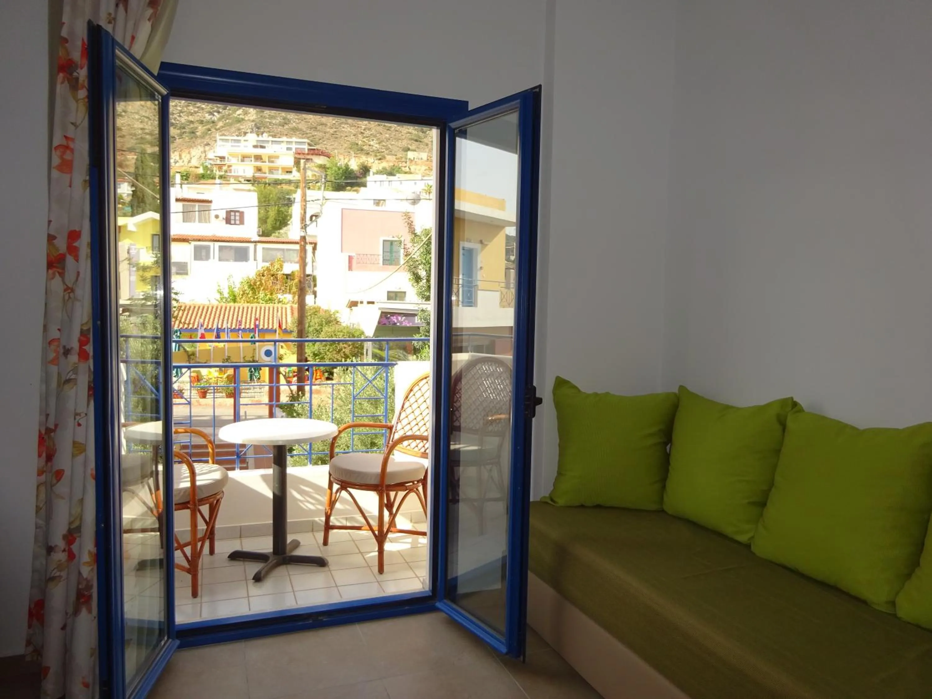 Bed in Astra Village & Suites