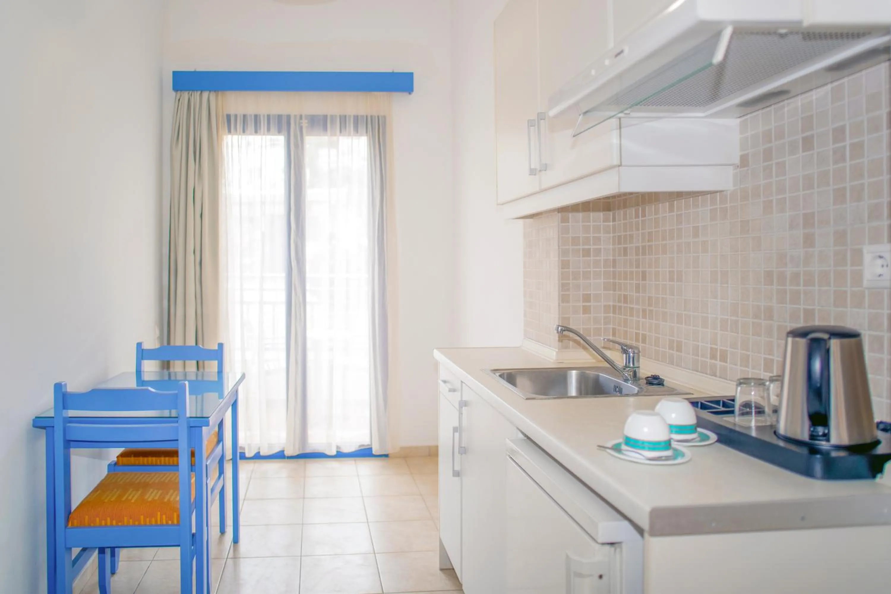 Coffee/tea facilities in Astra Village & Suites