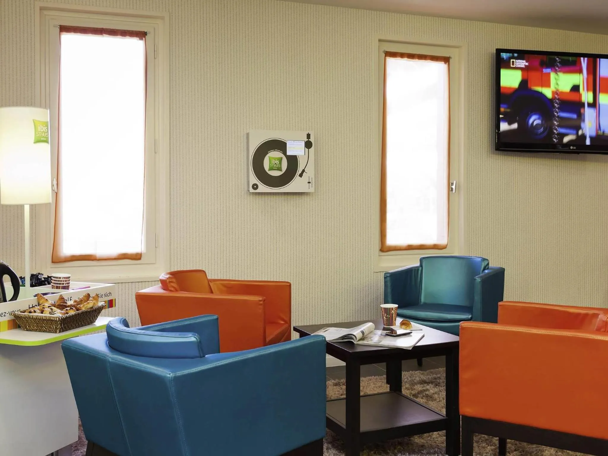 Lounge or bar in ibis Styles Périgueux Trélissac