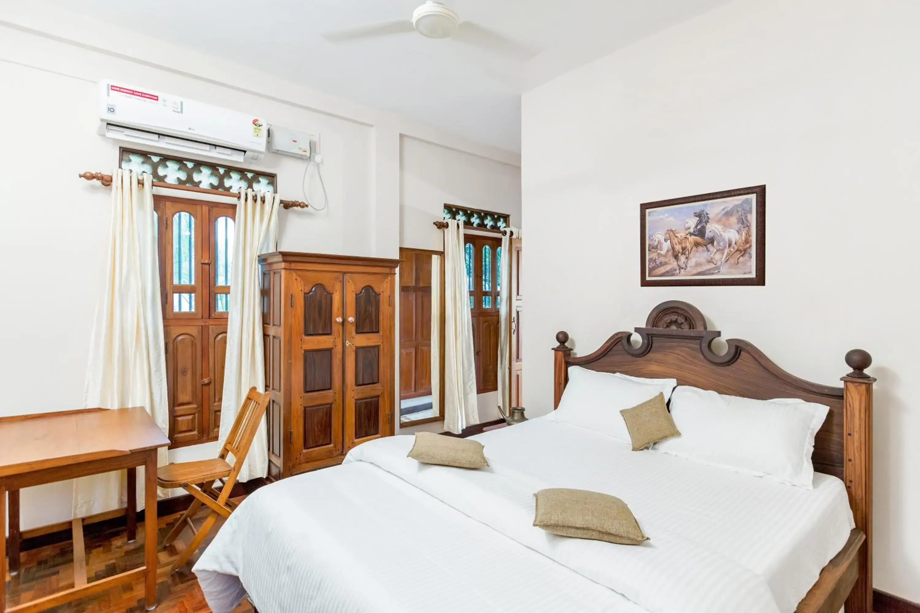 Deluxe Double Room (2 Adults + 1 Child) - single occupancy in Kumarakom Wood Castle Serviced Appartments Deluxe Double Room (2 Adults + 1 Child) - single occupancy in Kumarakom Wood Castle Serviced Appartments