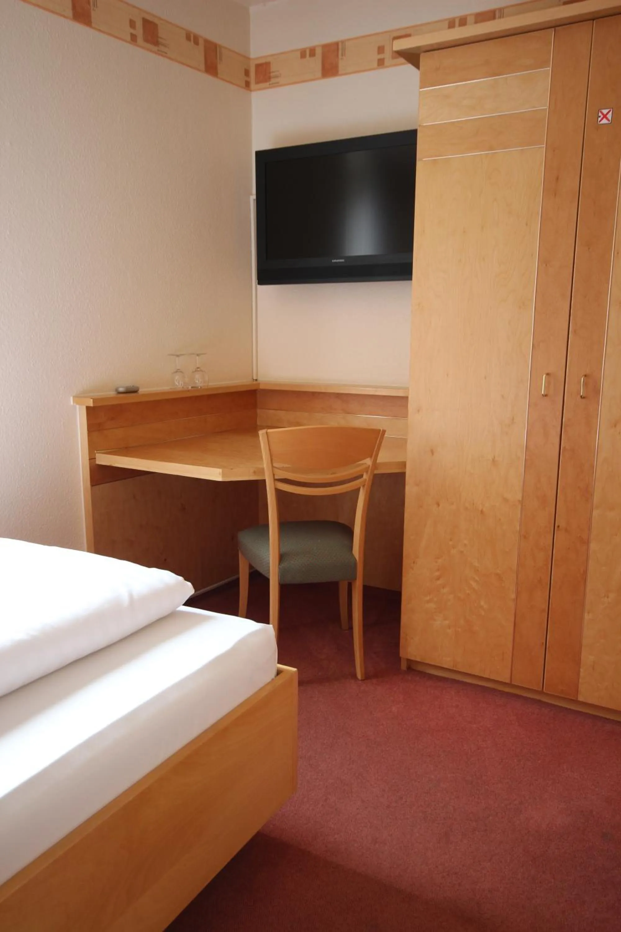 Photo of the whole room, Bed in Hotel Glockengasse