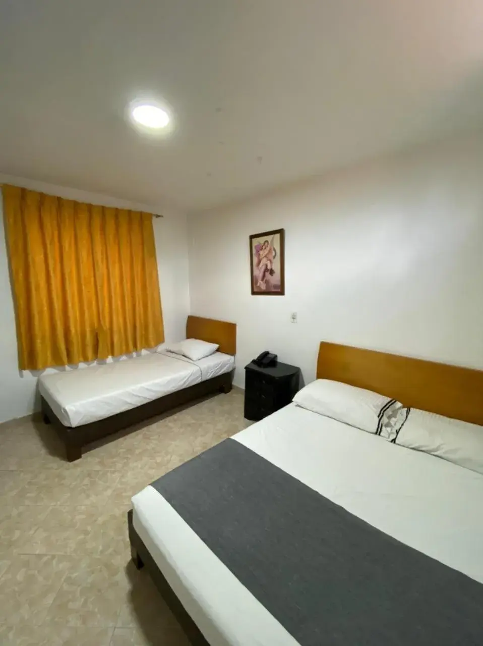 Standard Quadruple Room in Hotel Gran Imperio Standard Quadruple Room in Hotel Gran Imperio