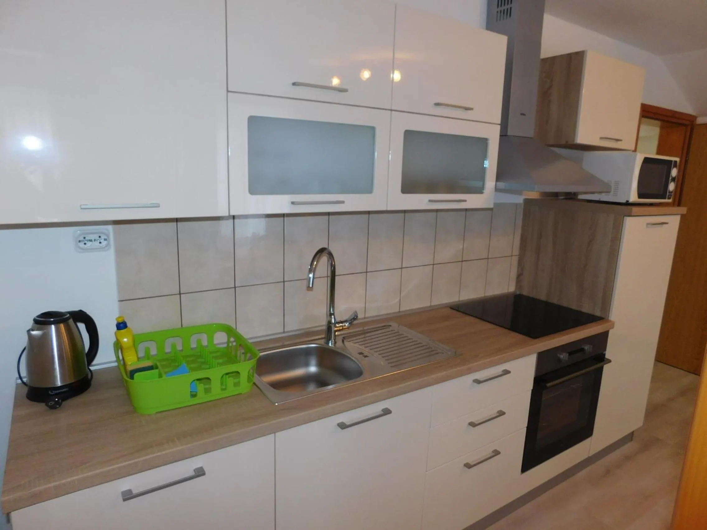 Kitchen or kitchenette in Guesthouse Sara