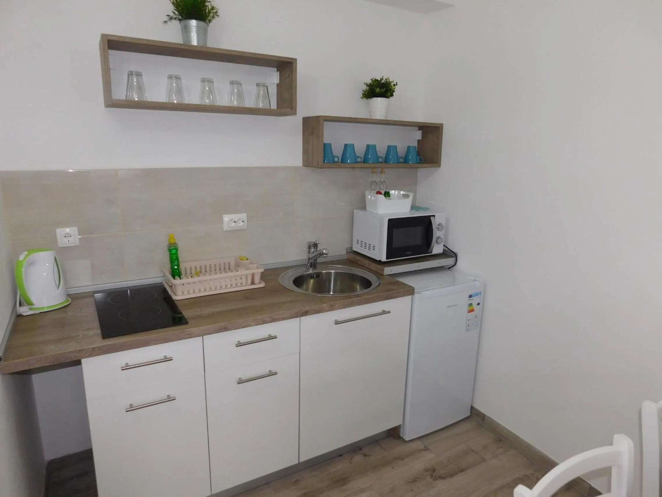 Kitchen or kitchenette in Guesthouse Sara