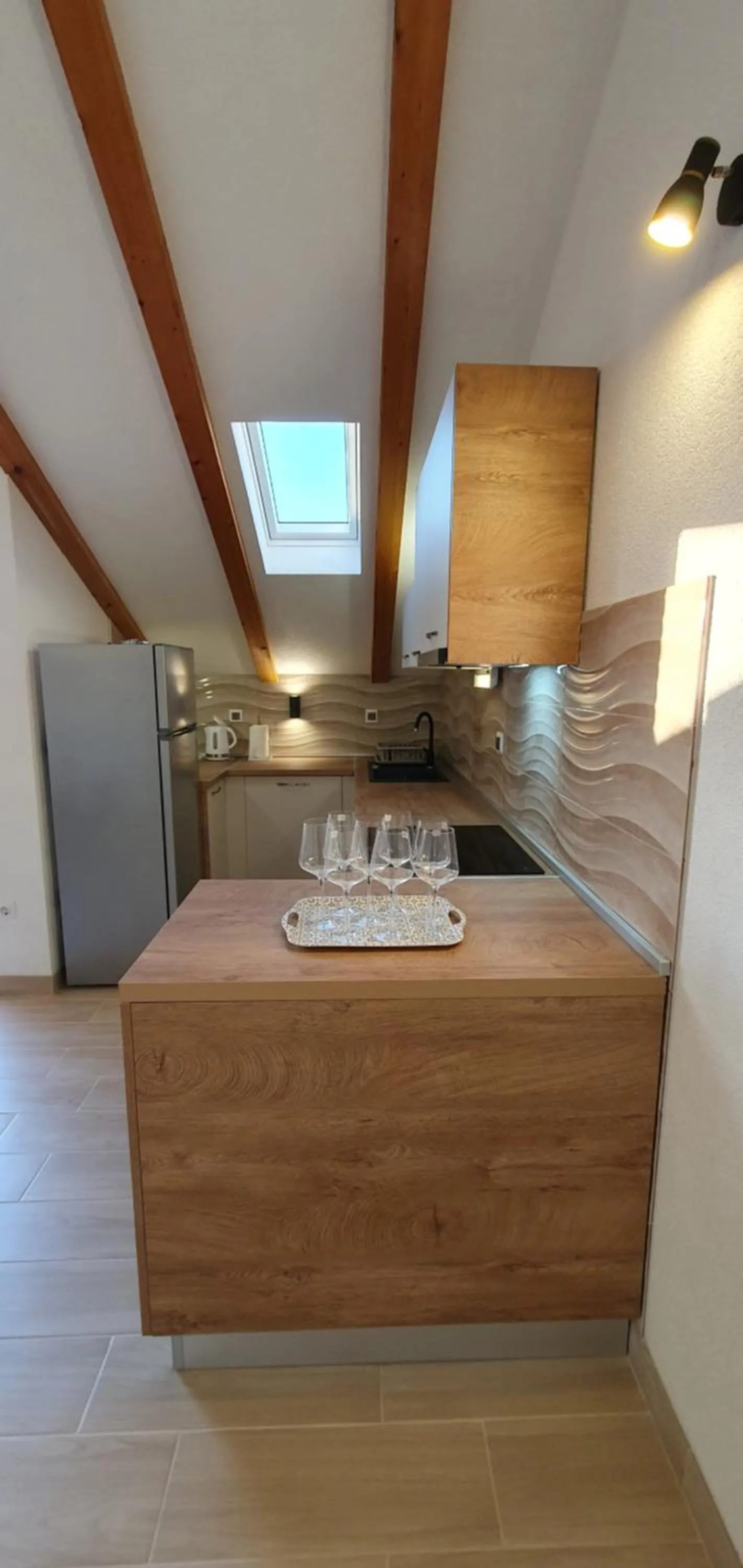 Kitchen or kitchenette in Apartments and Rooms Zvjezdana