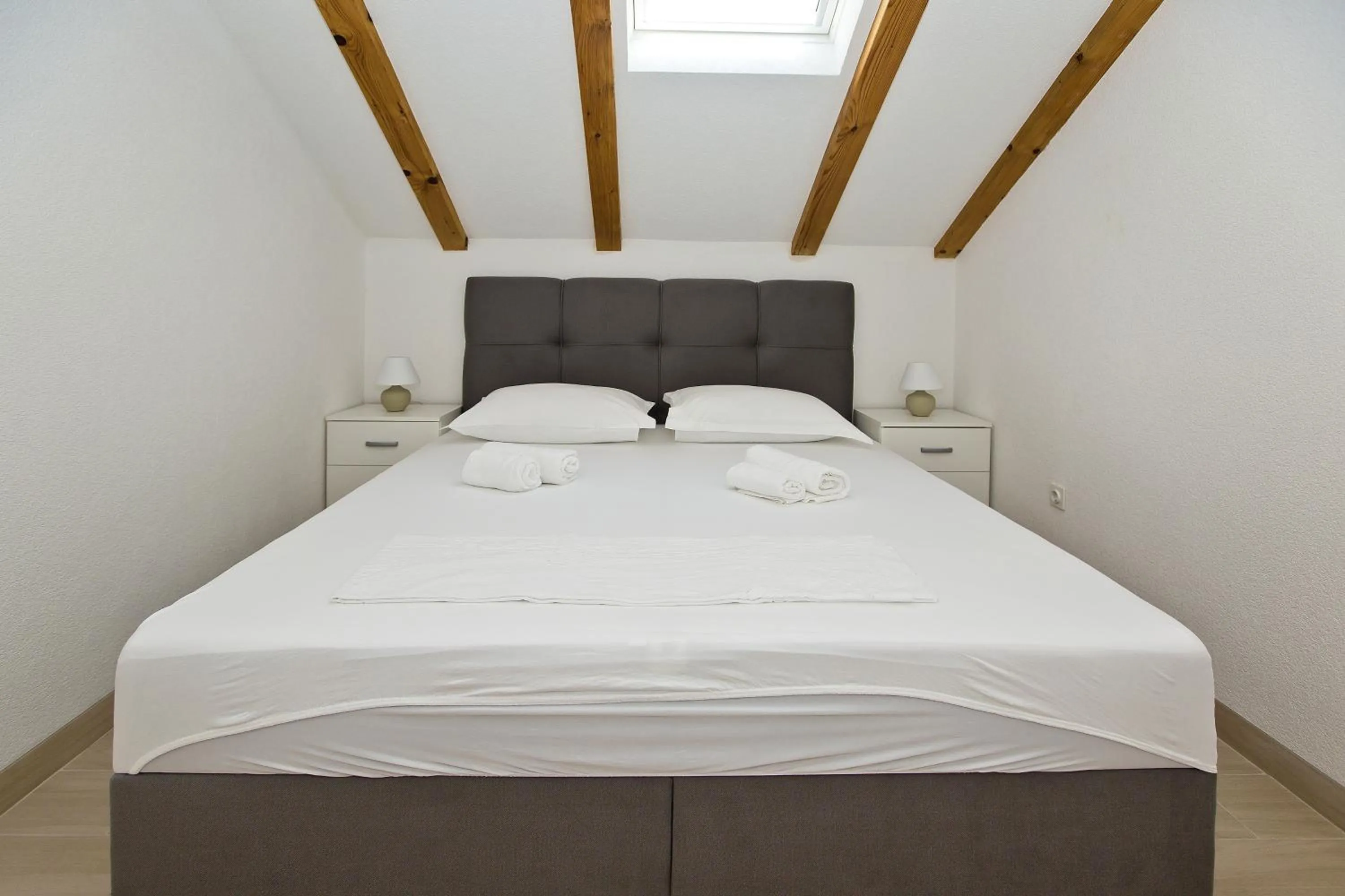 Bed in Apartments and Rooms Zvjezdana