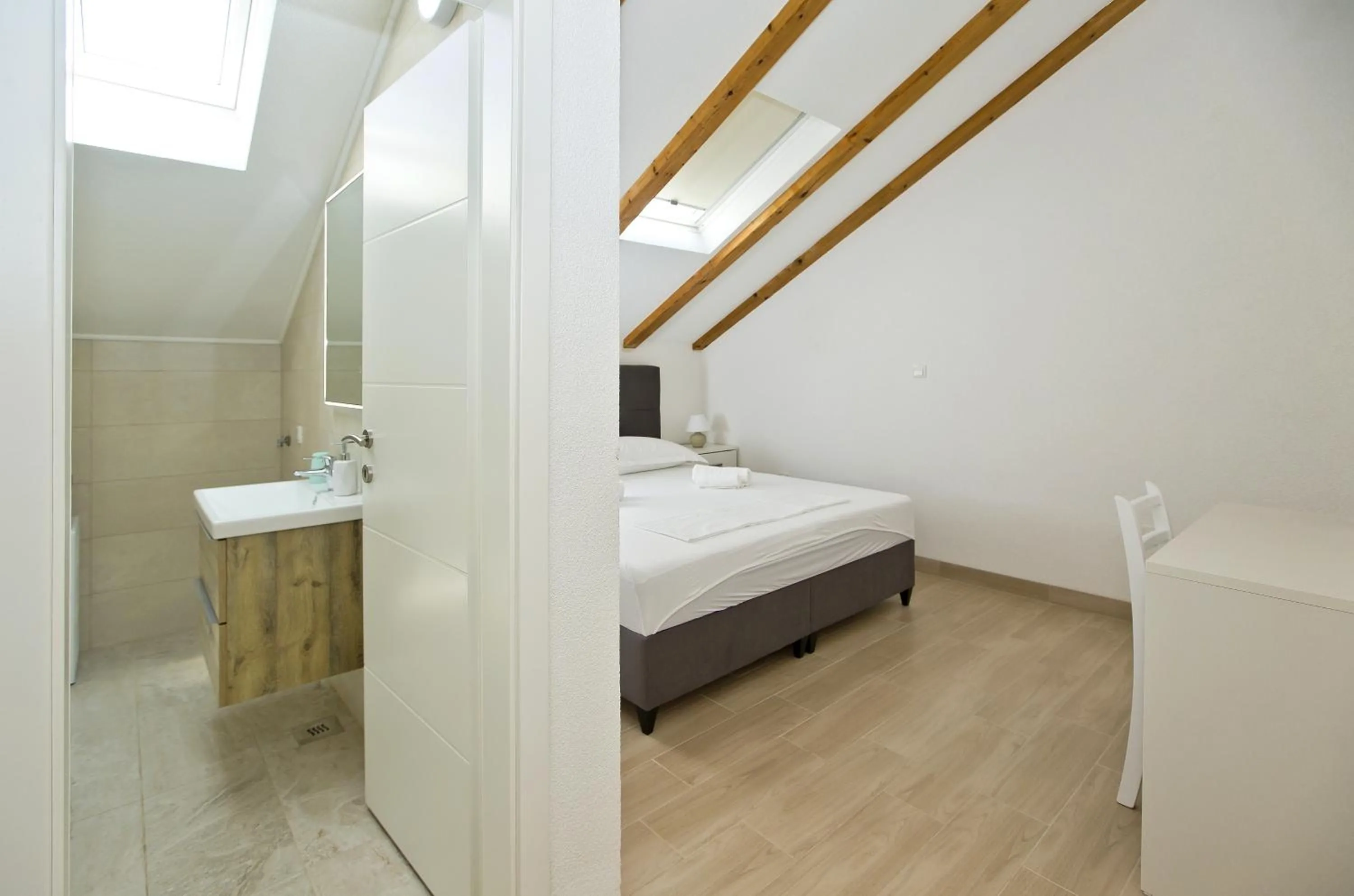 Bed in Apartments and Rooms Zvjezdana