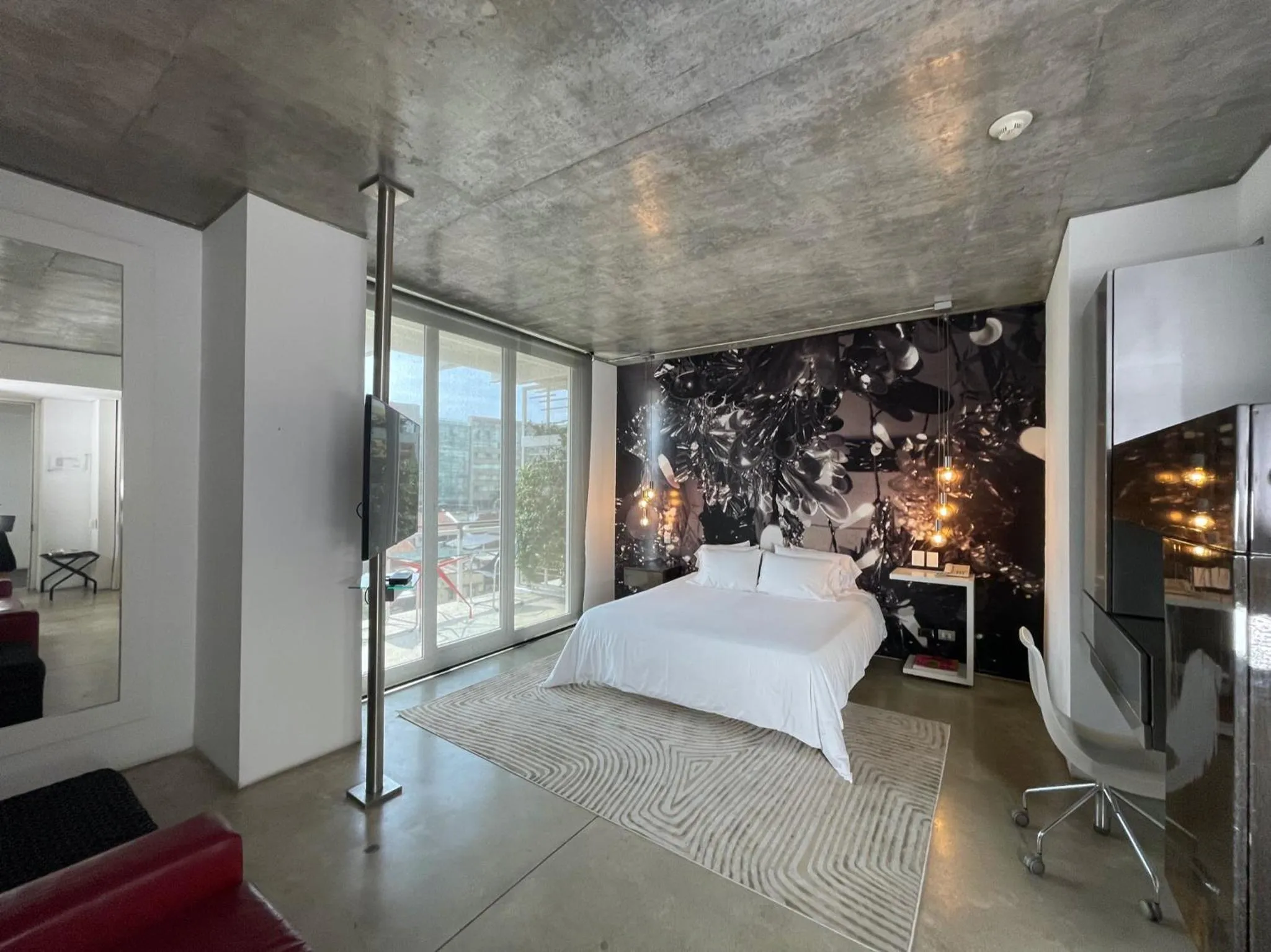 Photo of the whole room, Bed in Now Hotel Cali