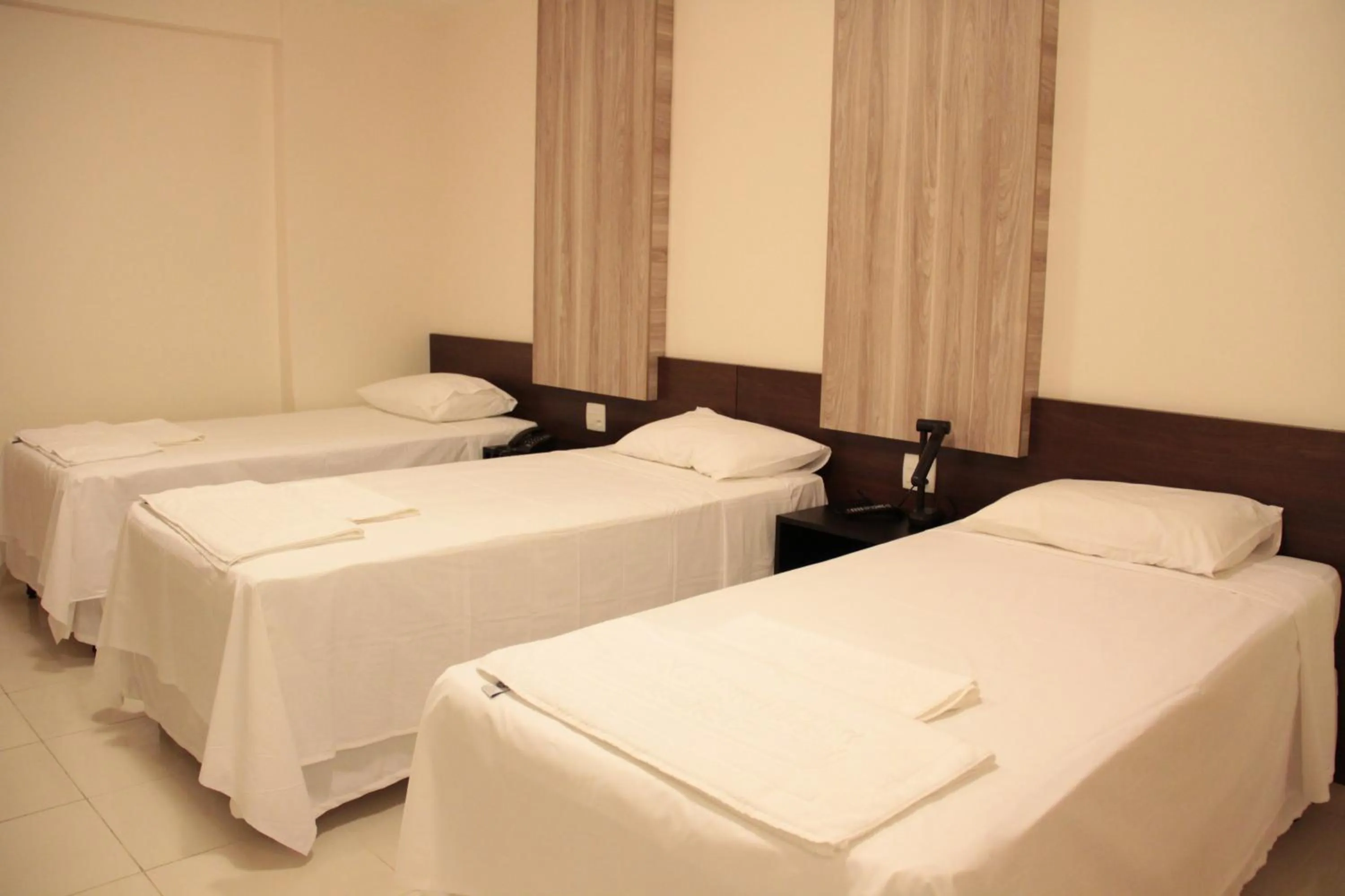 Bed in Executivo Hotel