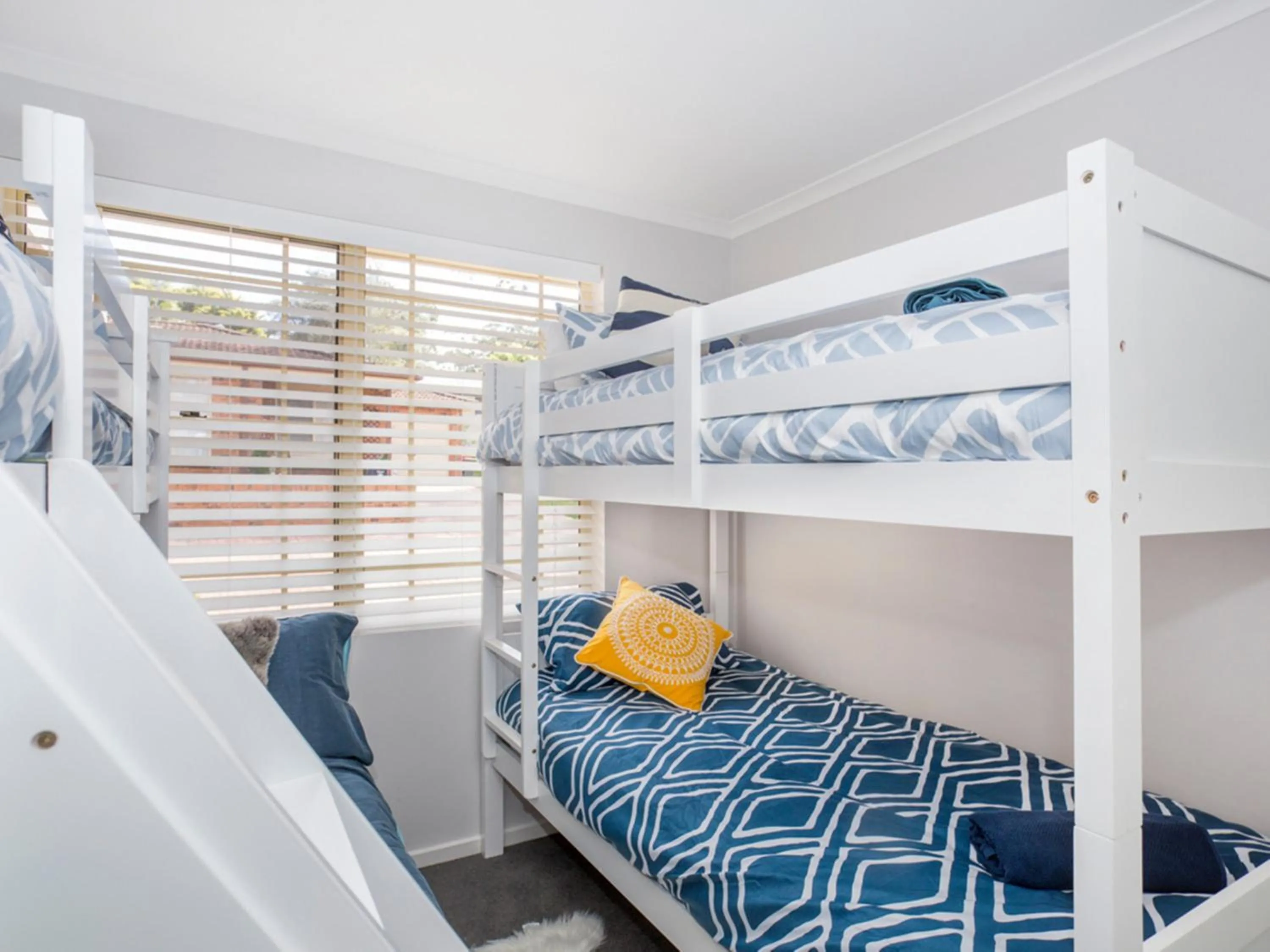 Bed in Fairway Haven Getaway