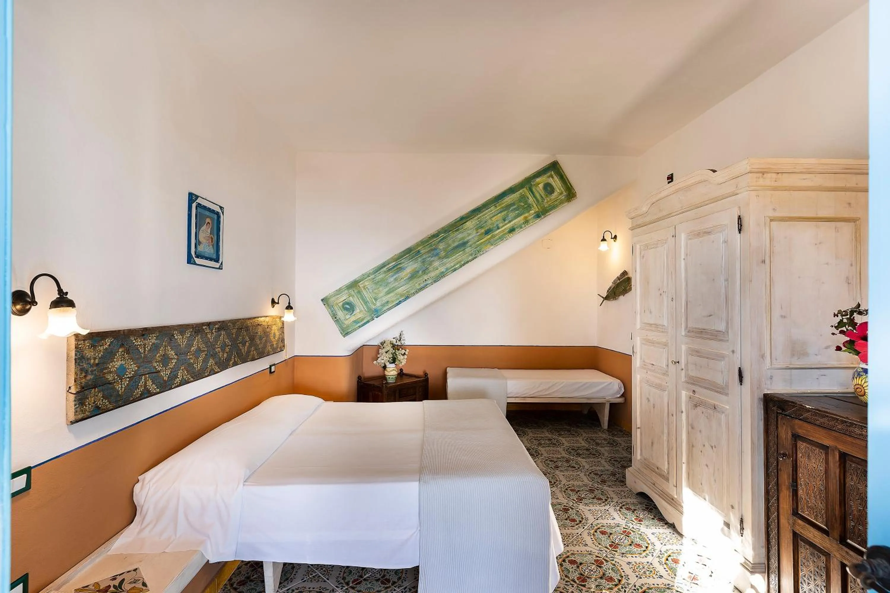 Bed in Hotel Mamma Santina