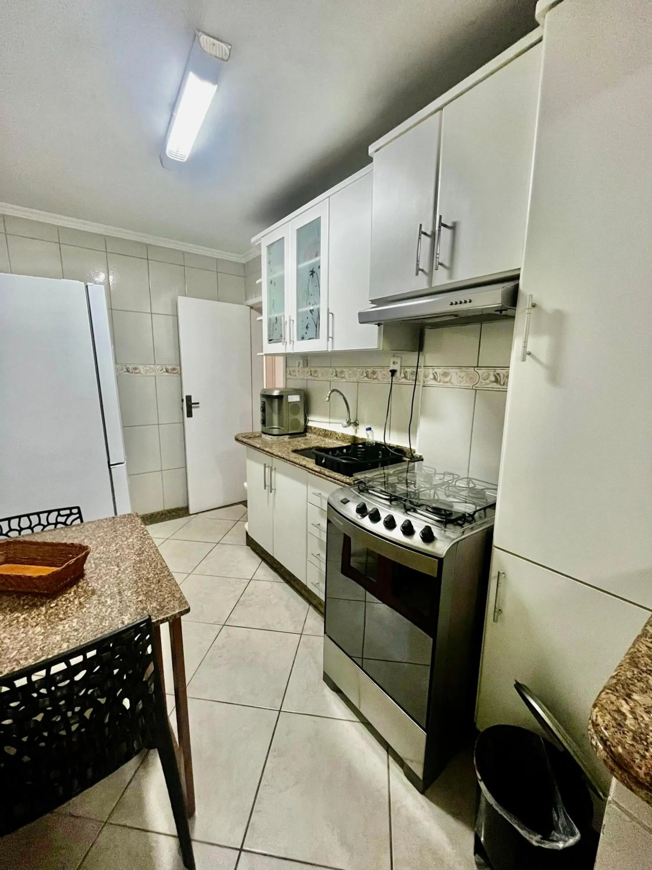 stove in Fantástico apartamento Frente ao mar em Balneário Camboriú