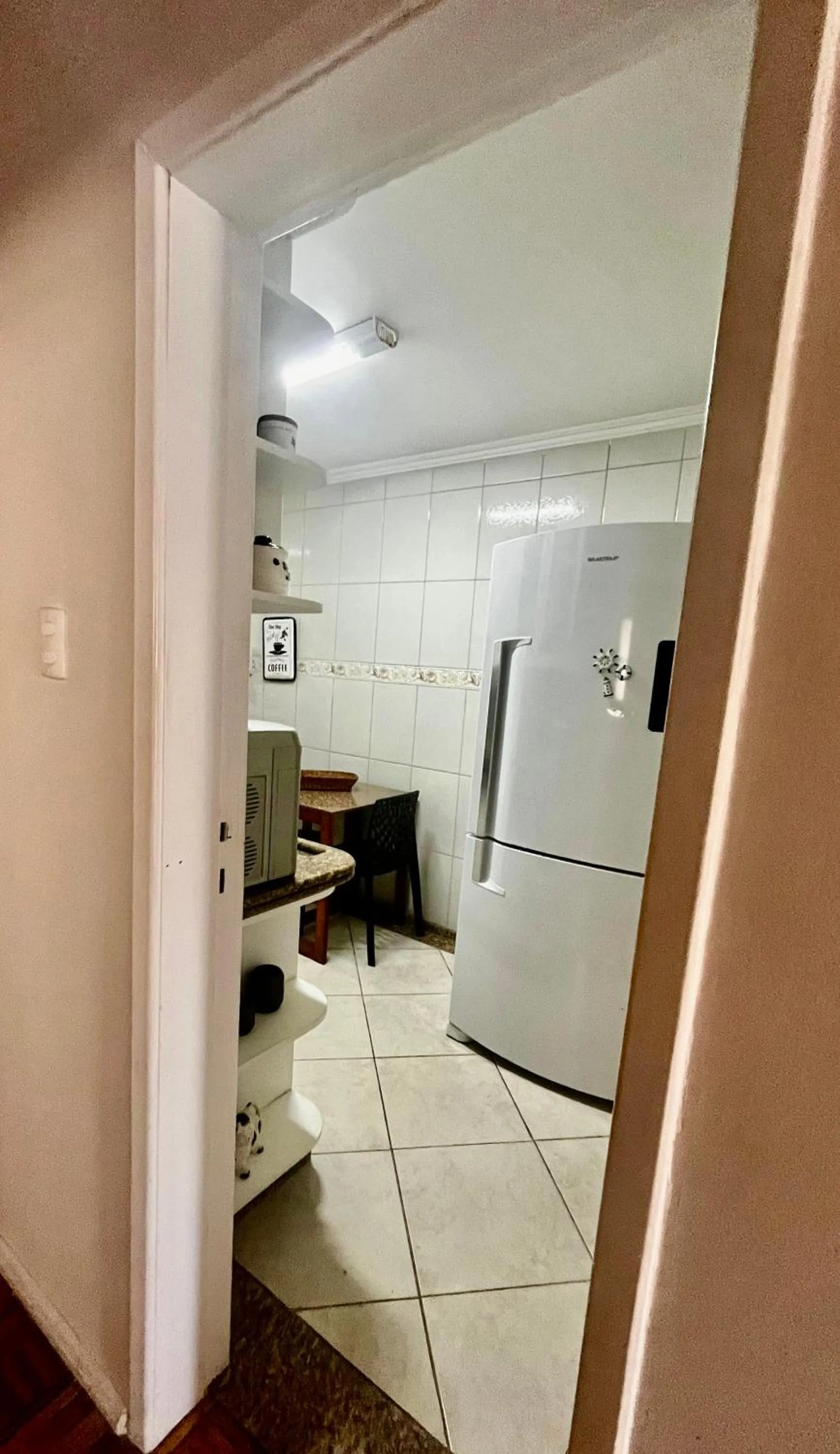 Communal kitchen in Fantástico apartamento Frente ao mar em Balneário Camboriú