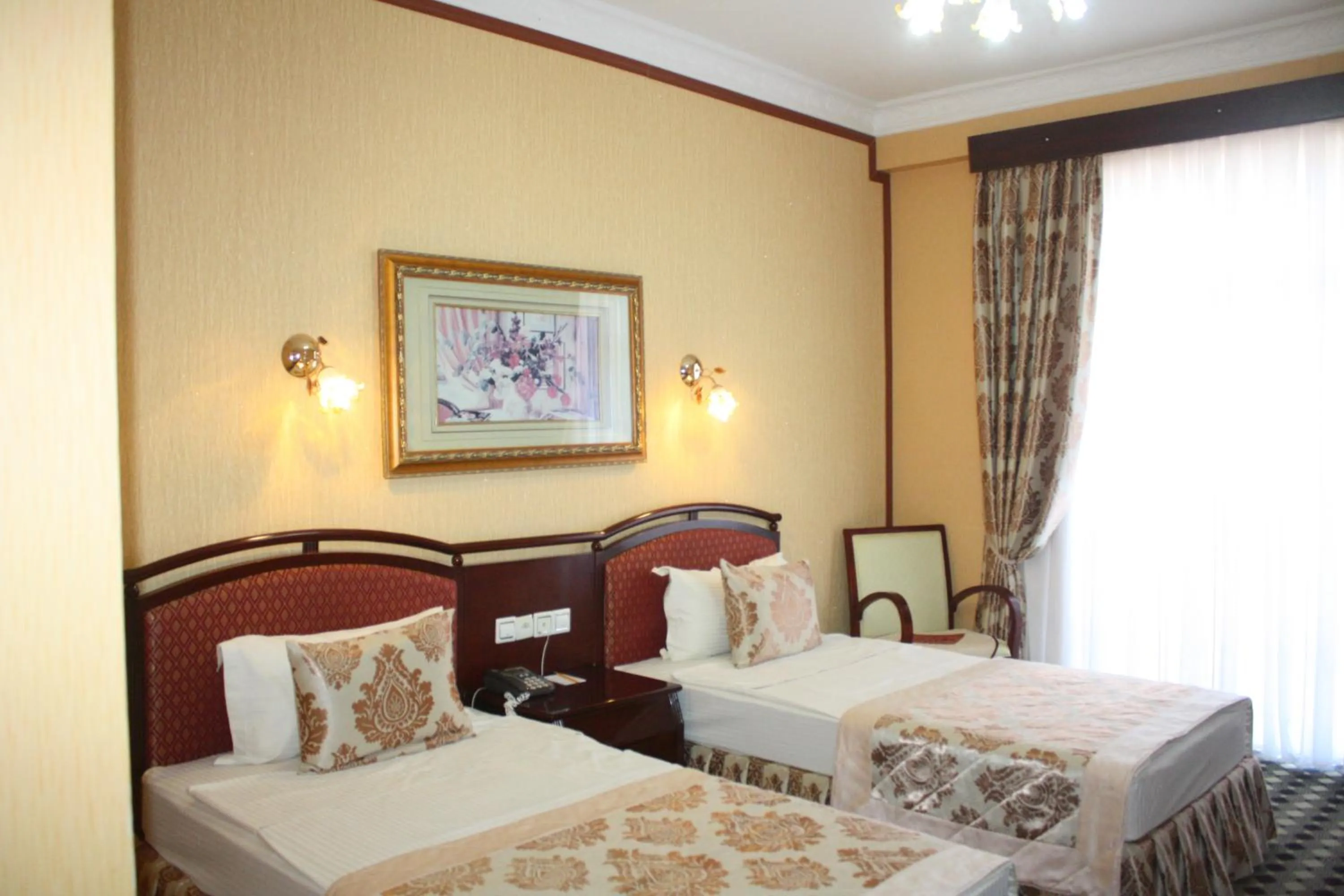 Bed in Hotel Asia Bukhara