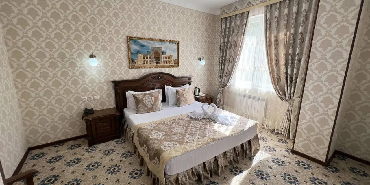 Bed in Hotel Asia Bukhara
