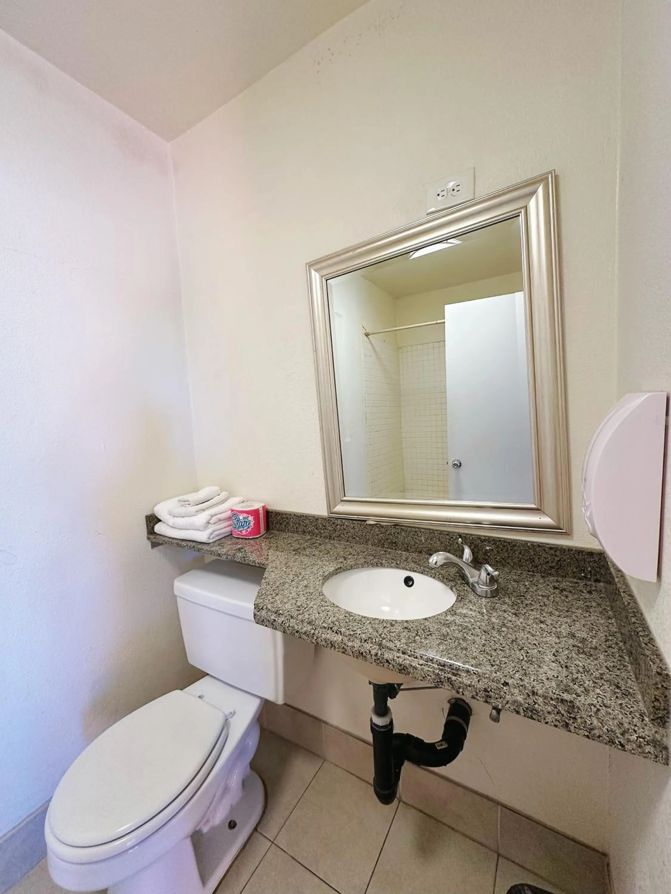 Toilet in Royal Inn and Suites