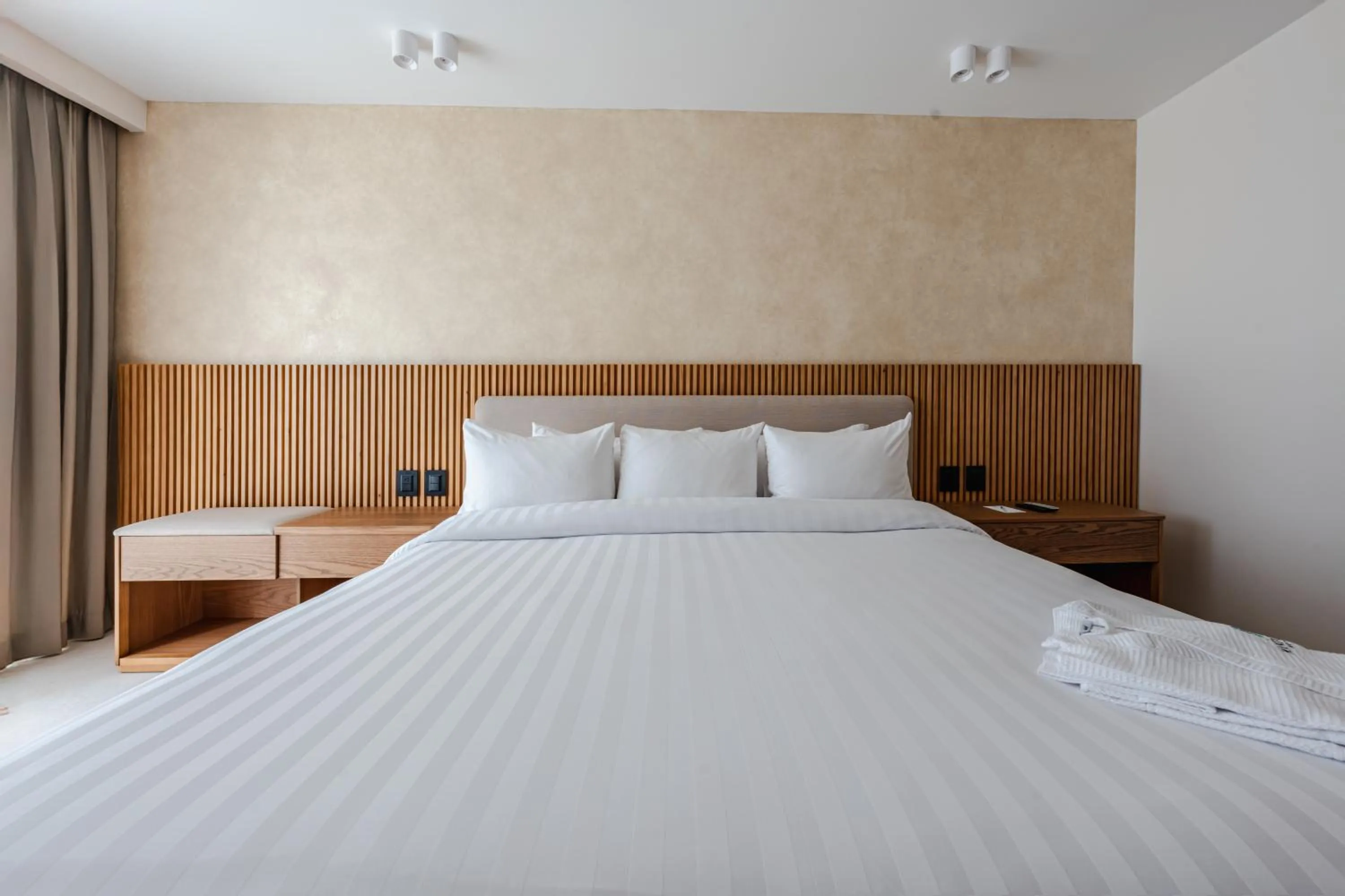 Bed in MantaHost Hotel