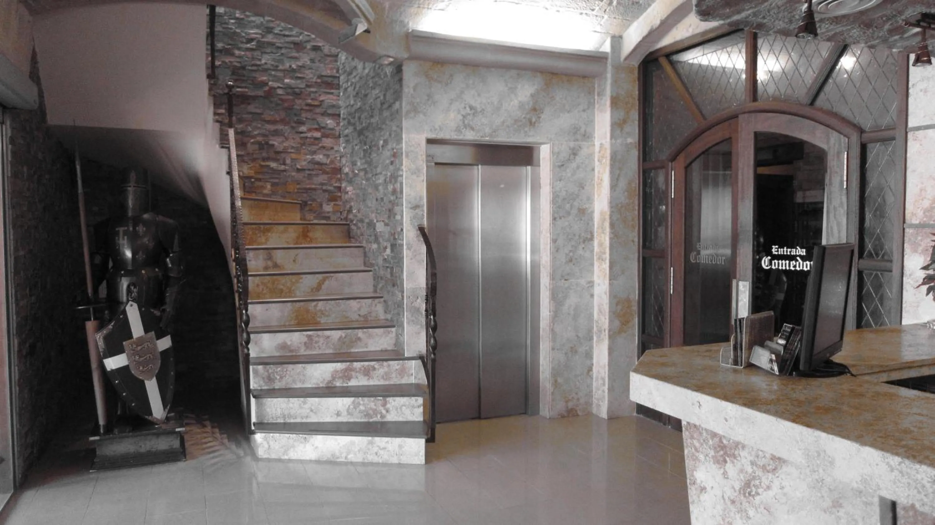 Lobby or reception in Hotel La Brasa