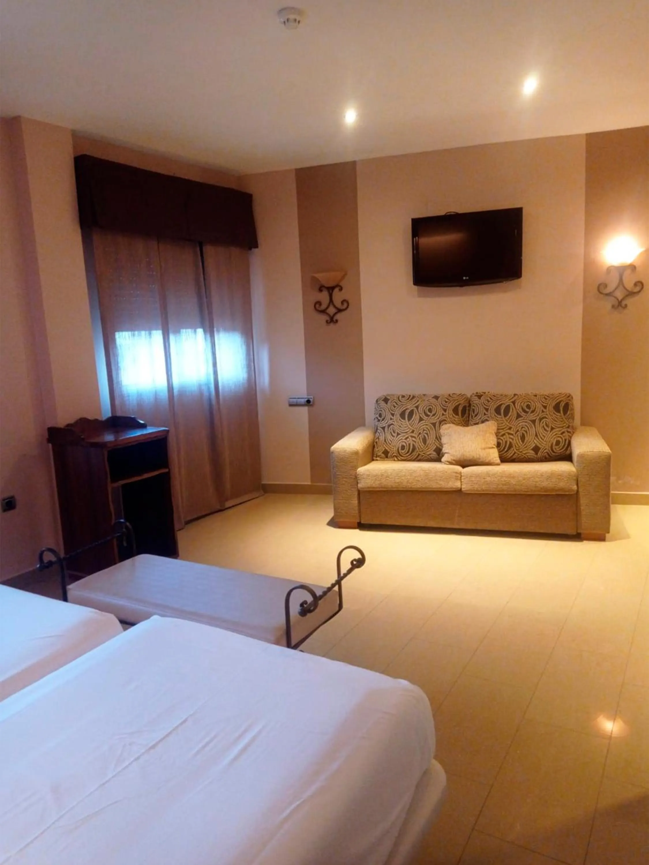 Bed in Hotel La Brasa