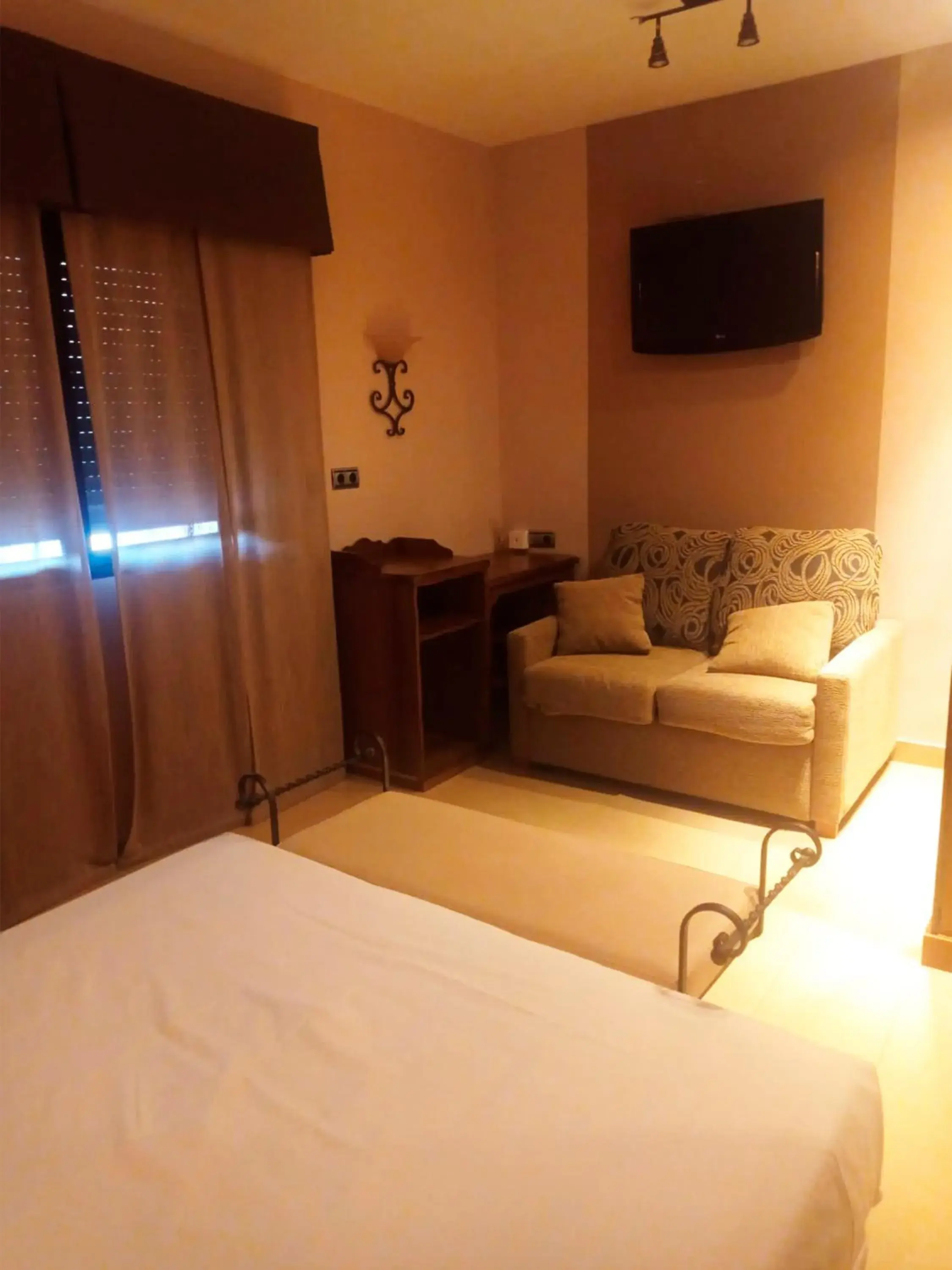 Superior Triple Room in Hotel La Brasa Superior Triple Room in Hotel La Brasa