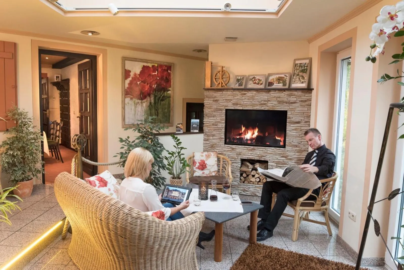 Communal lounge/ TV room in Hotel Restaurant Lohmühle