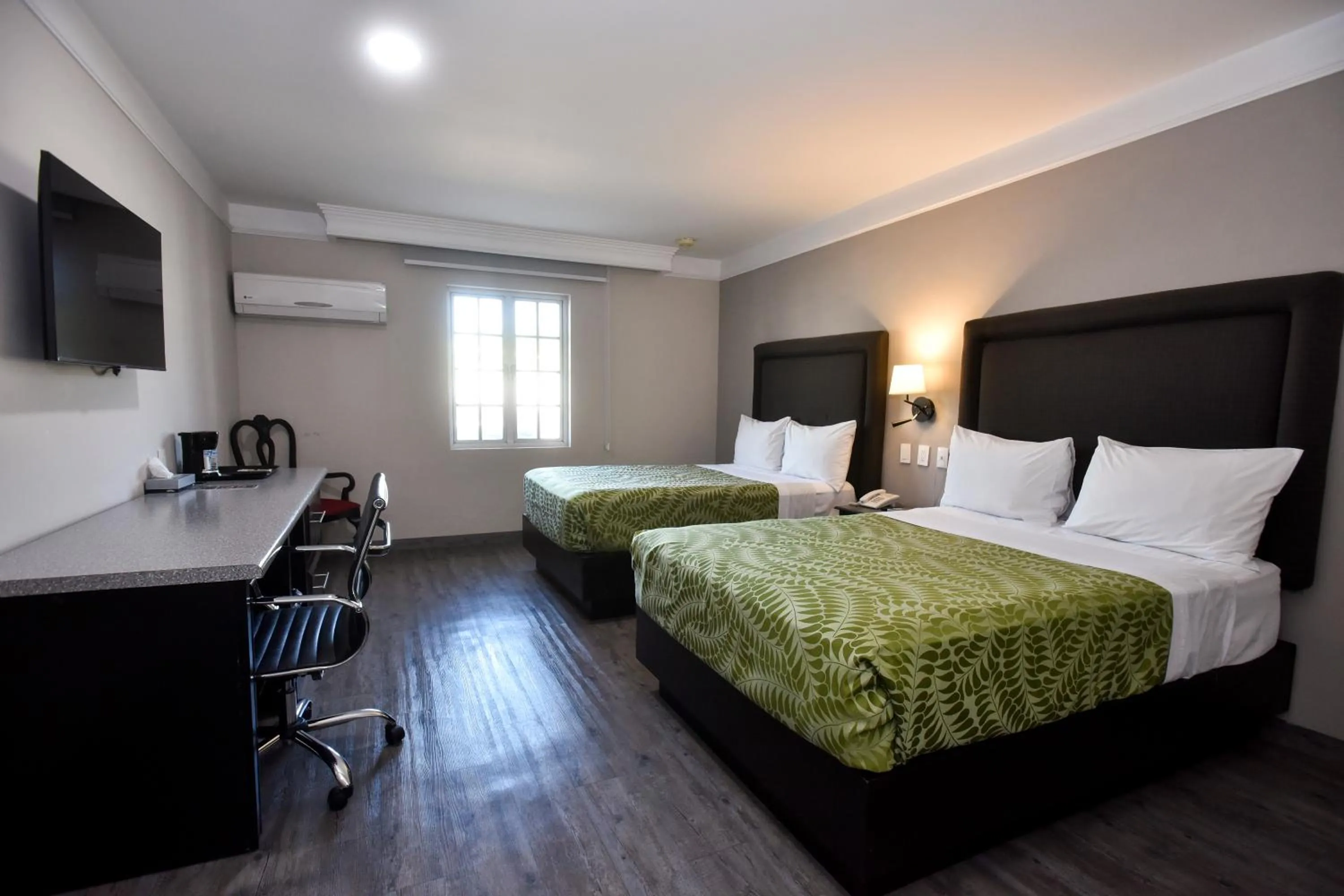 Photo of the whole room, Bed in Plaza Camelinas Hotel