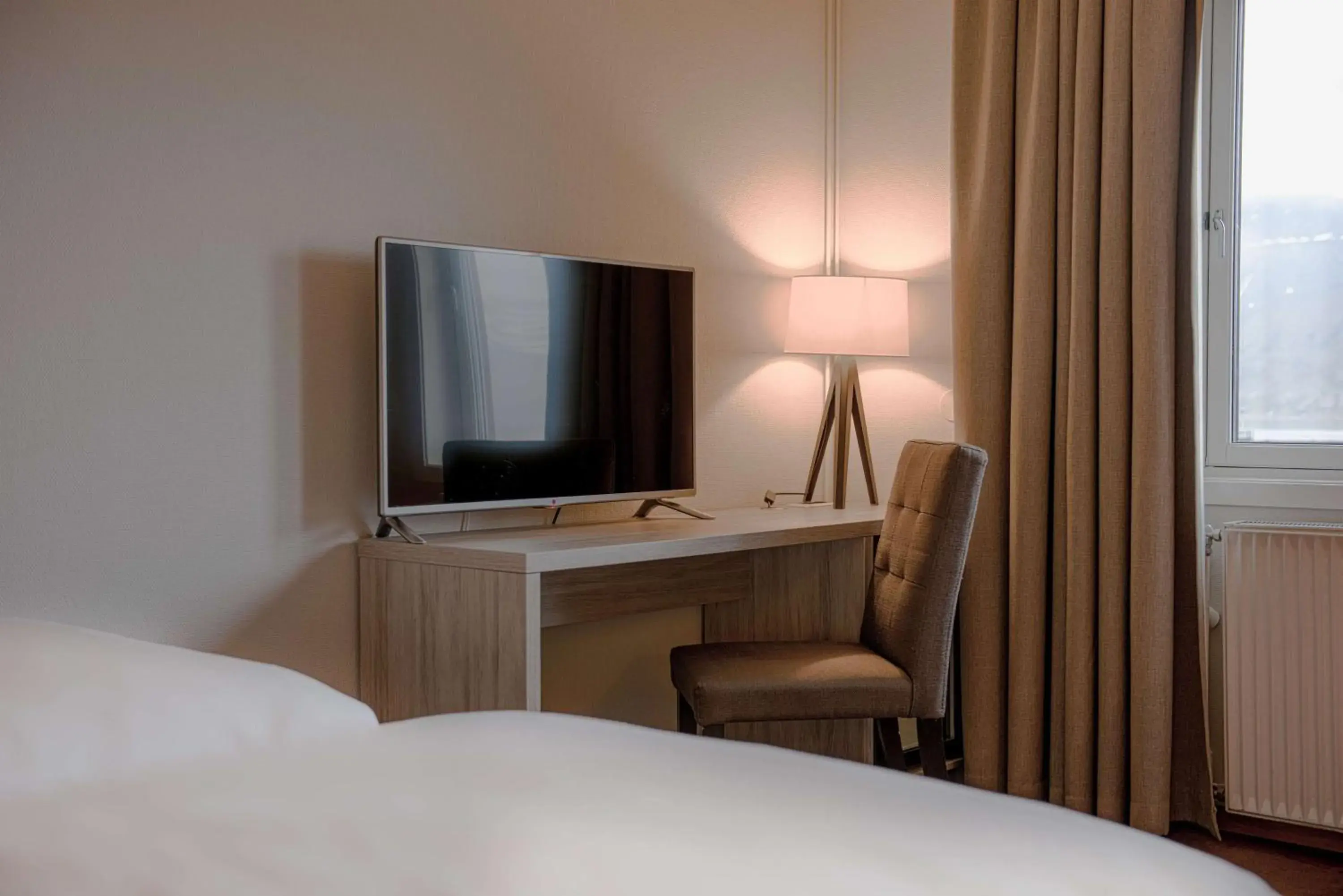 Photo of the whole room, Bed in Radisson Blu Polar Hotel, Spitsbergen Photo of the whole room, Bed in Radisson Blu Polar Hotel, Spitsbergen