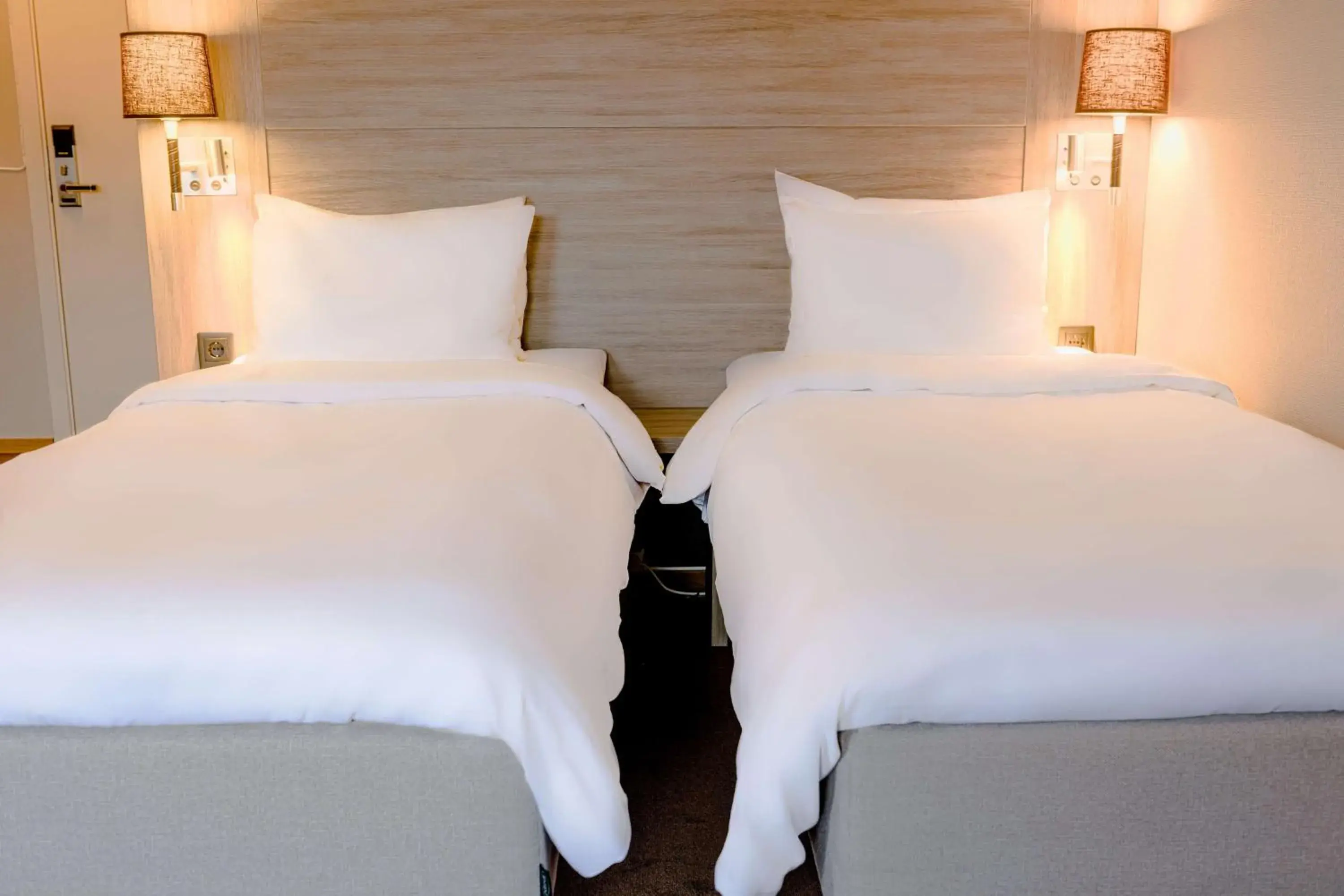 Photo of the whole room, Bed in Radisson Blu Polar Hotel, Spitsbergen Photo of the whole room, Bed in Radisson Blu Polar Hotel, Spitsbergen