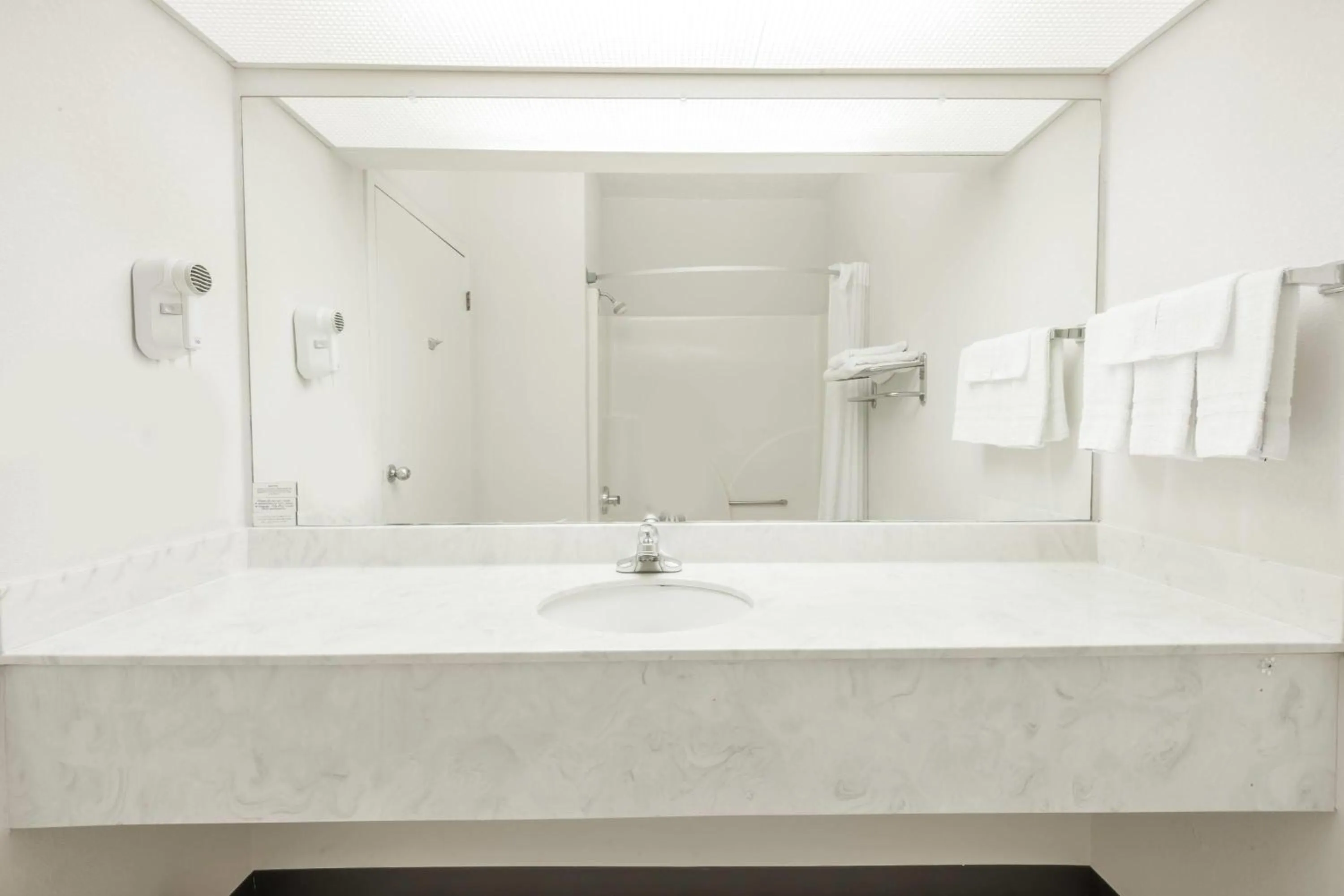 Bathroom in Days Inn by Wyndham Montgomery