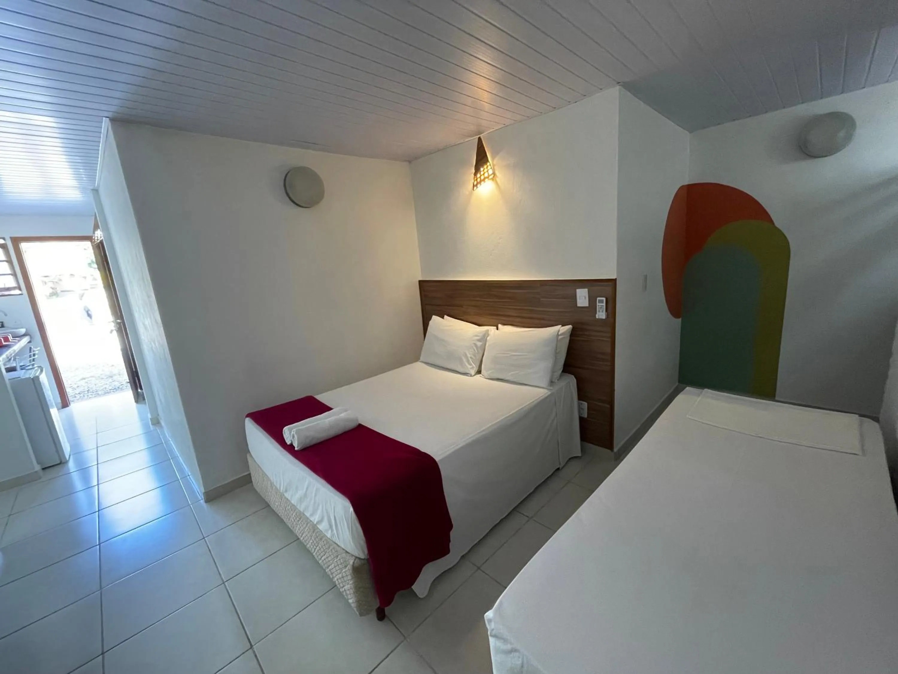 Bed in Pousada Ilha da Magia