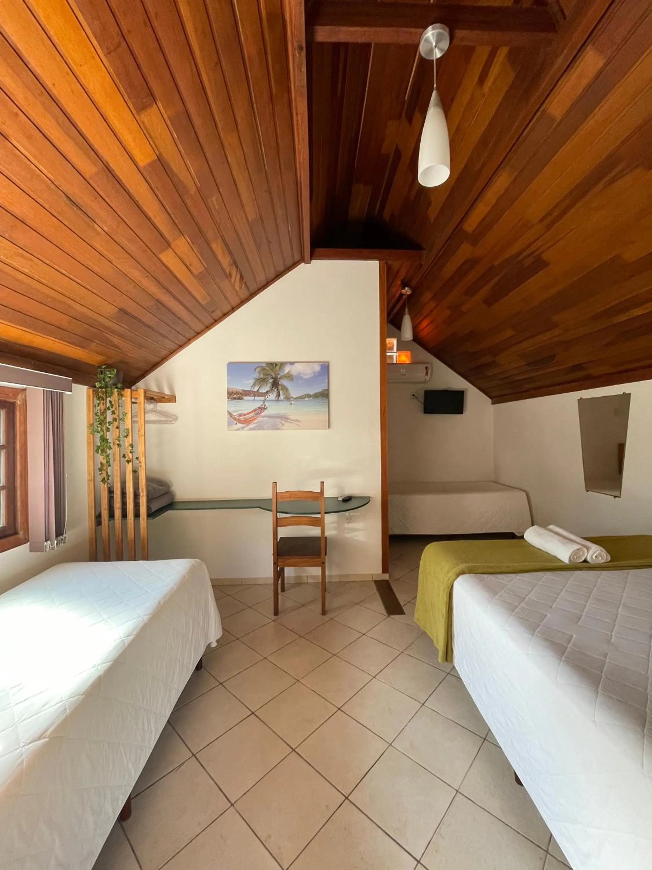 Bed in Pousada Ilha da Magia