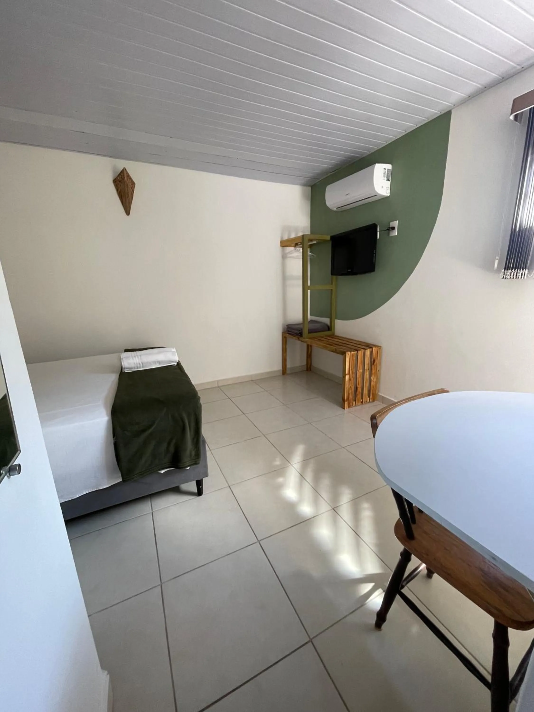 Bed in Pousada Ilha da Magia