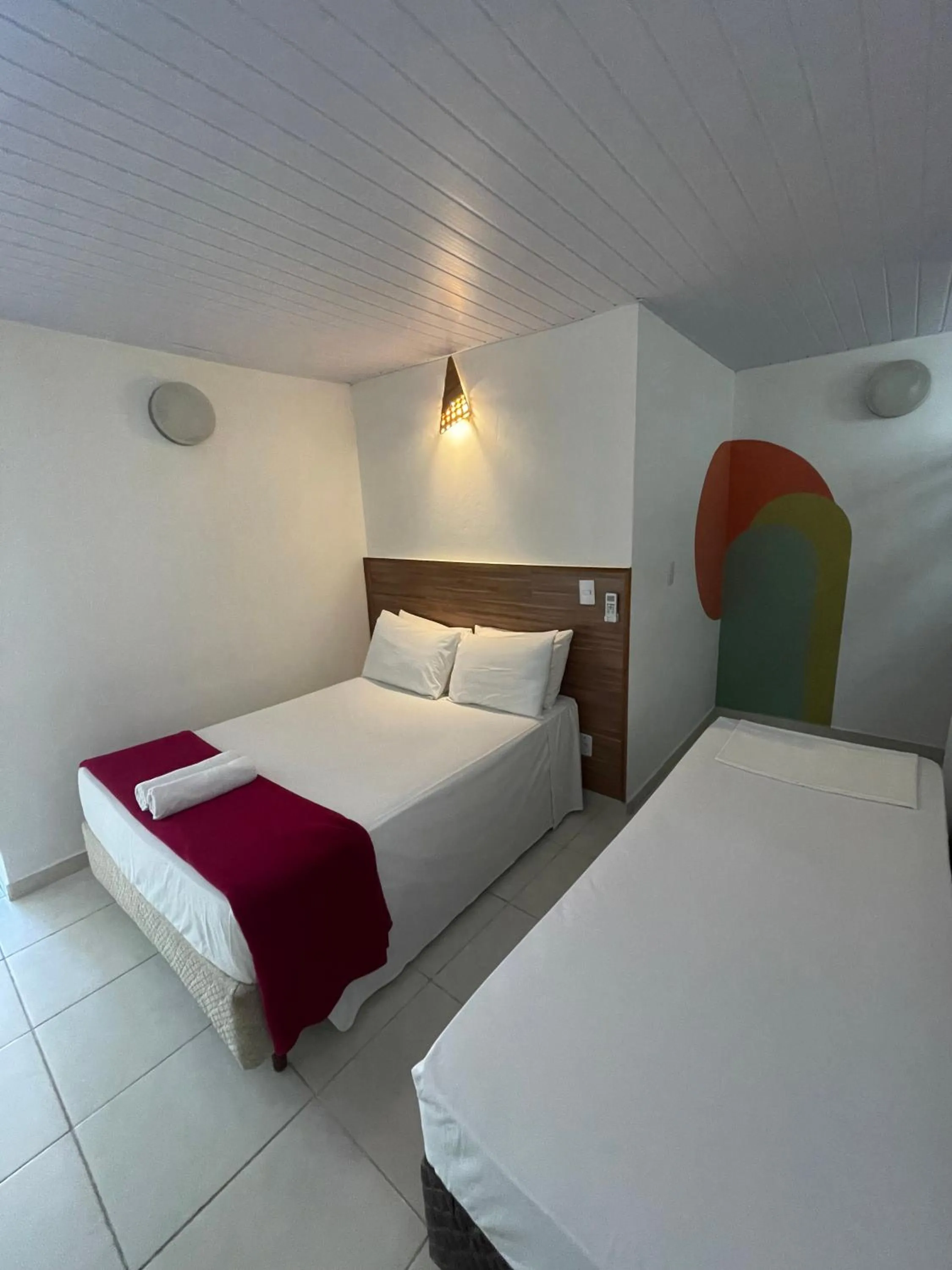 Bed in Pousada Ilha da Magia