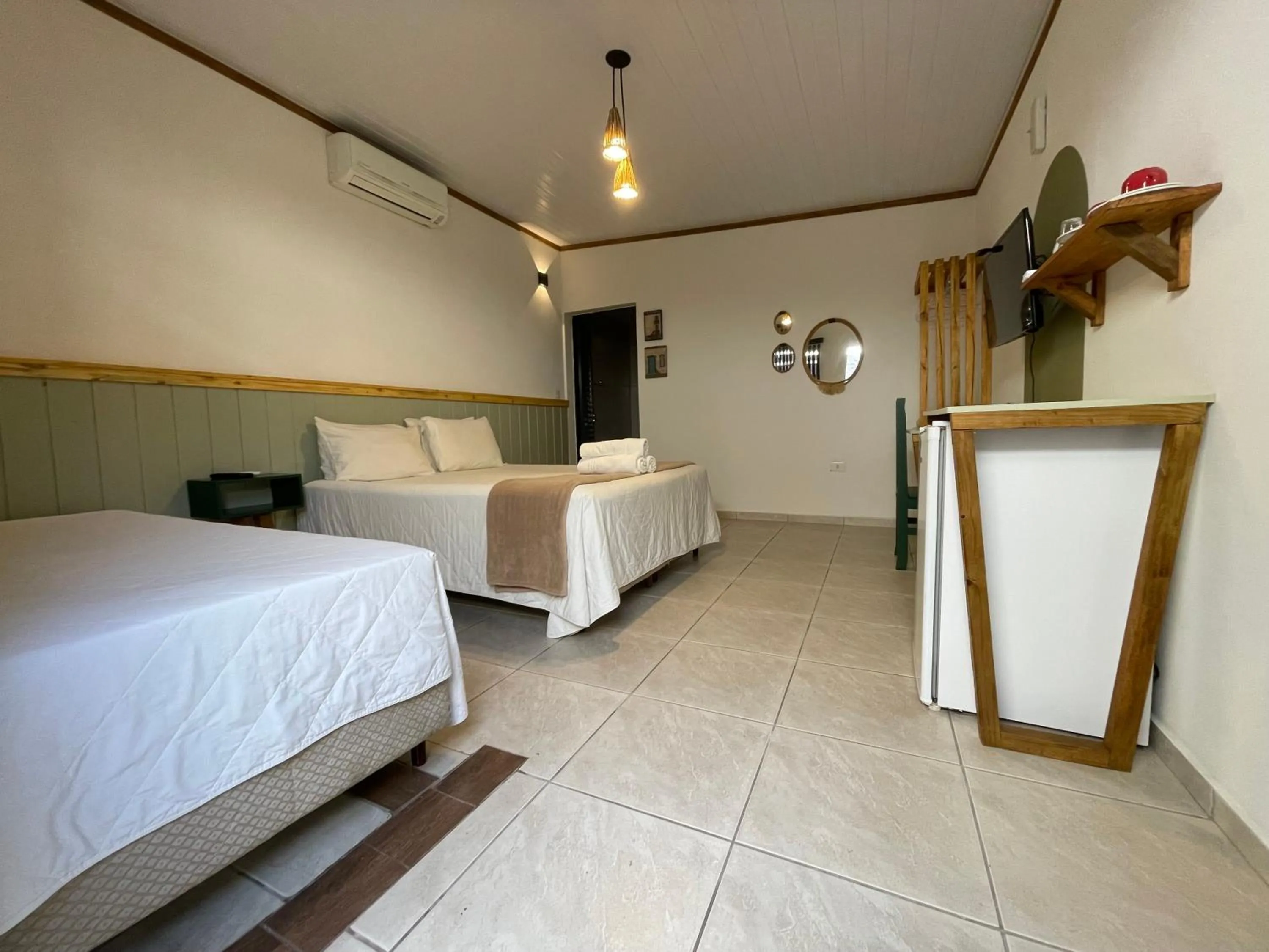 Bed in Pousada Ilha da Magia