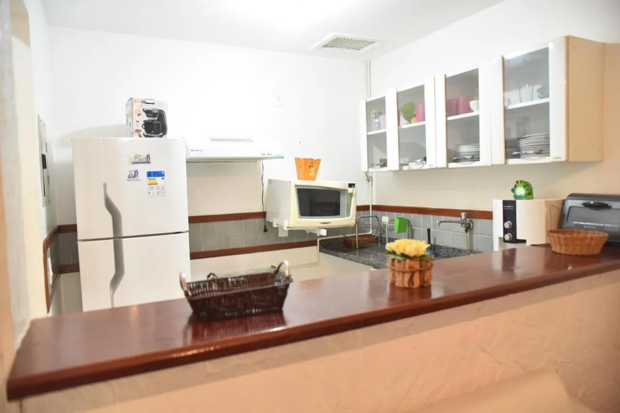 Kitchen or kitchenette in Apart Hotel em Búzios