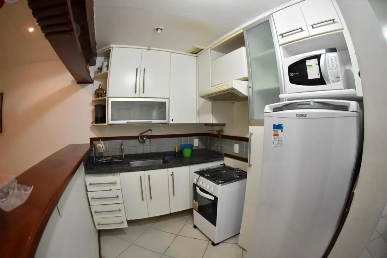 Kitchen or kitchenette in Apart Hotel em Búzios